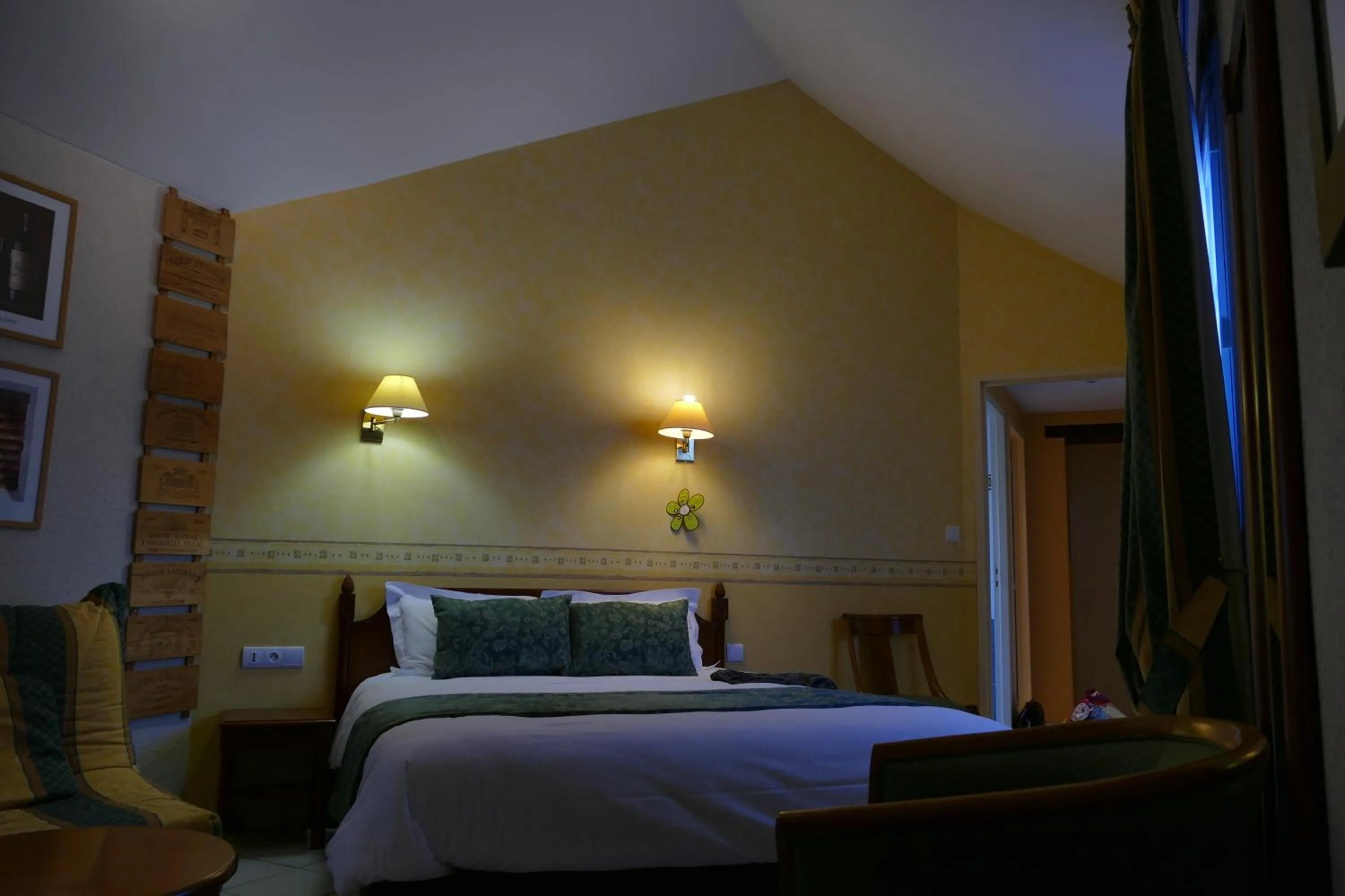Photo of the whole room, Bed in Logis Hotels Le Champalud Restaurant La Citadelle