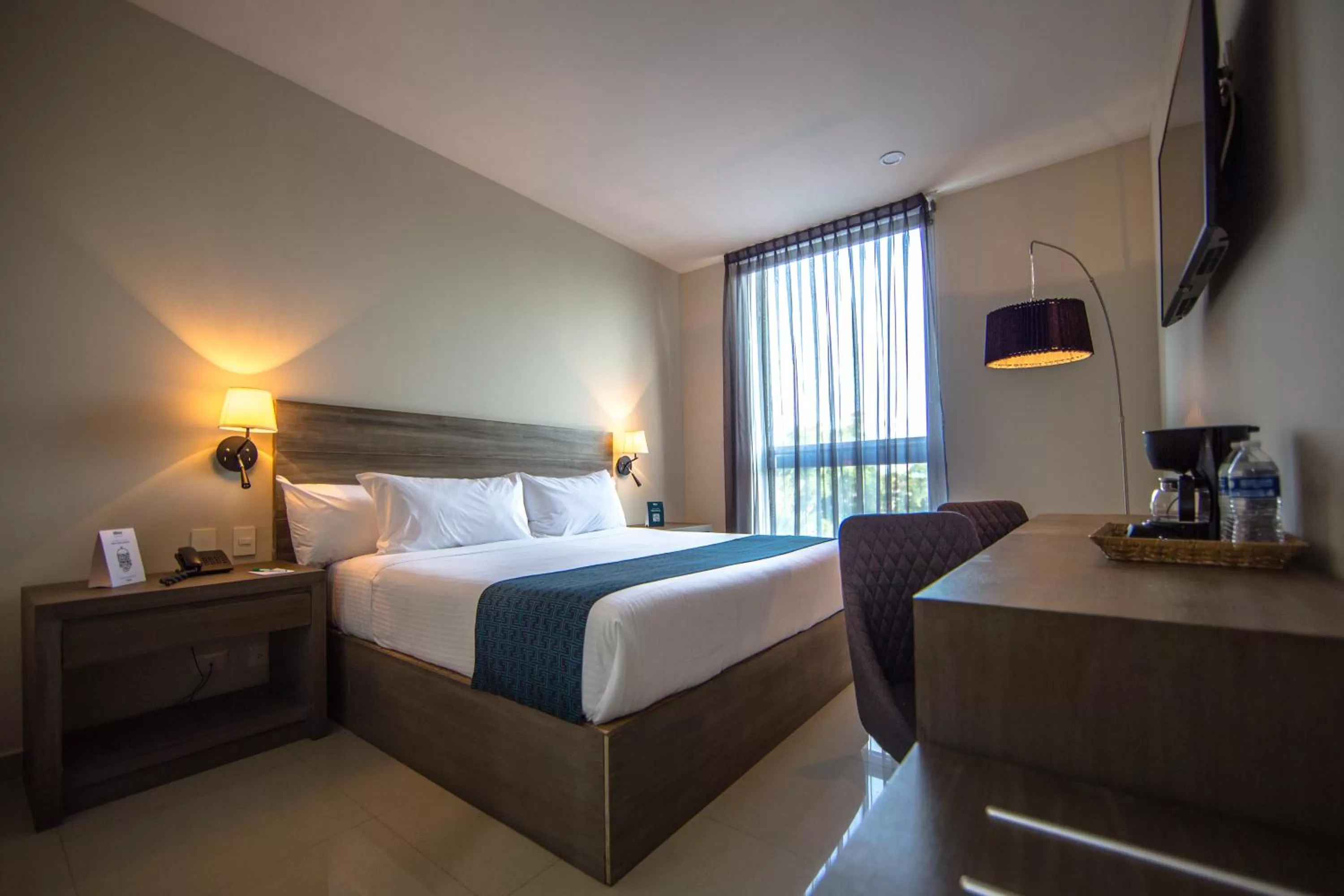 Photo of the whole room, Bed in InHouse Hotel Culiacán