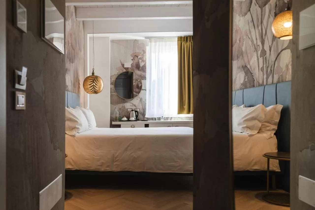 Bed in LUXURY SUITES ROCOPOM - Lake Front