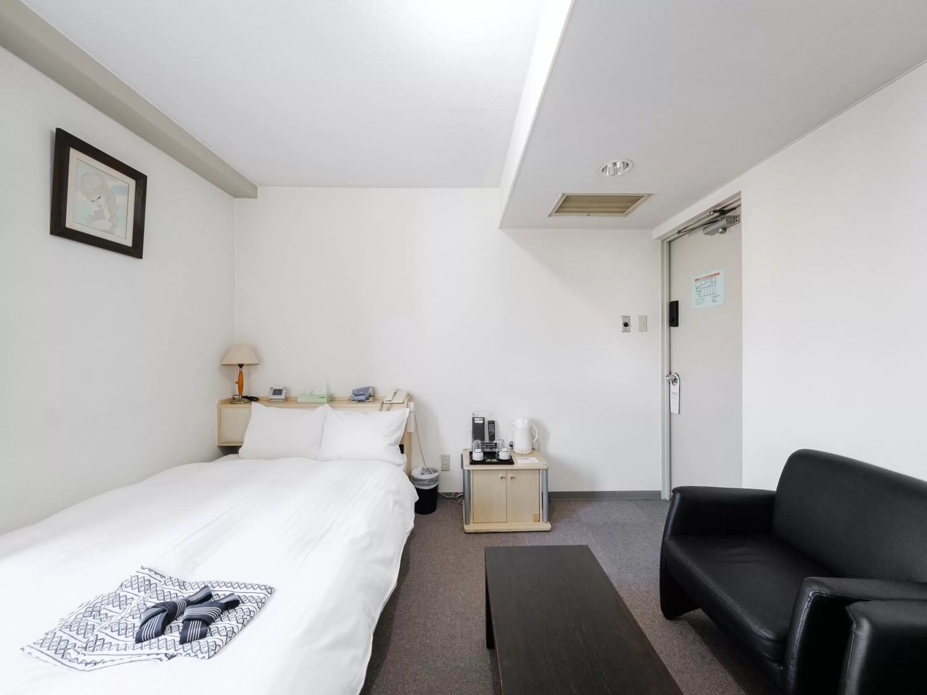 Bed in Tabist THE GREEN ASAHIKAWA