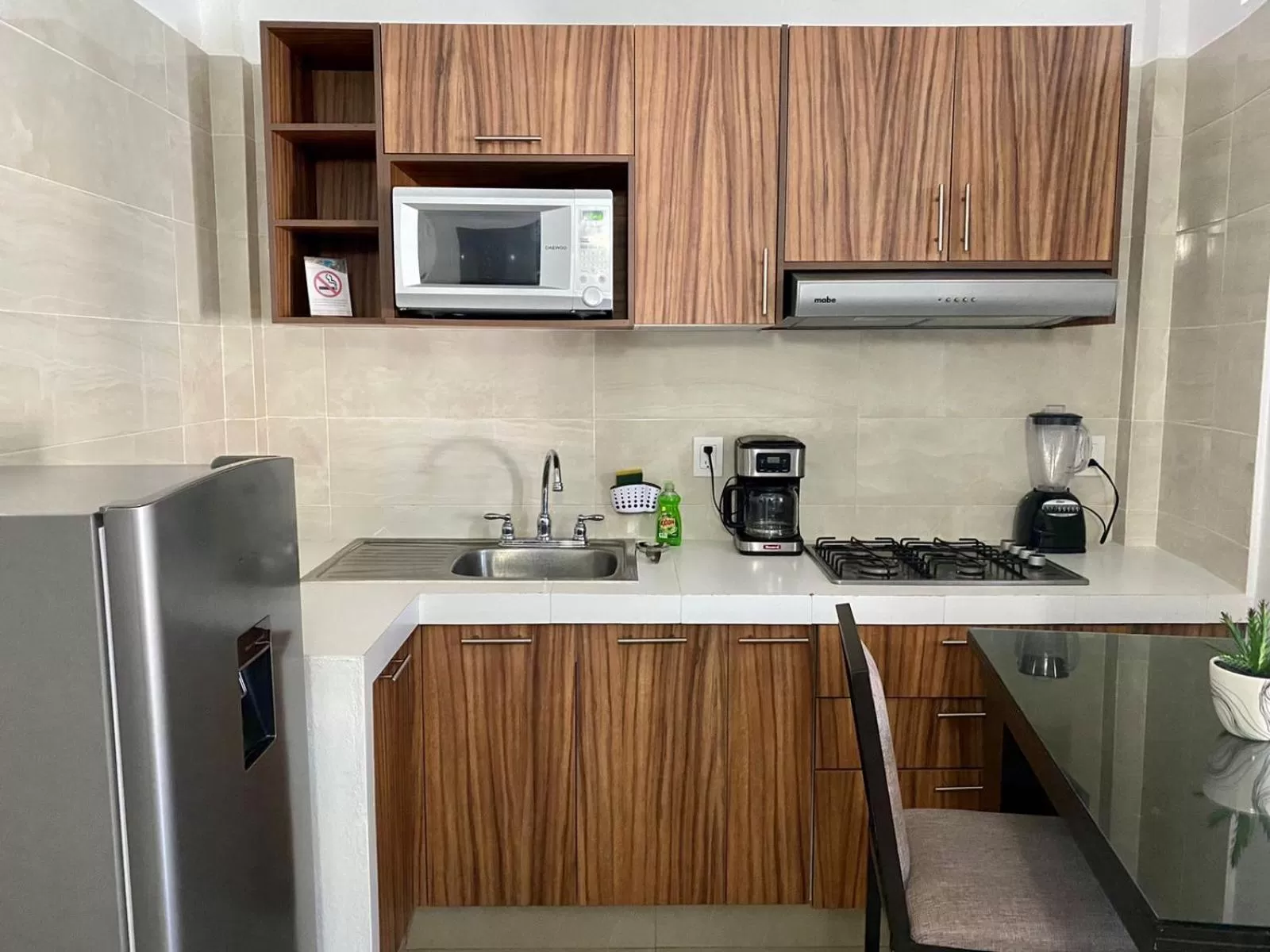 Coffee/tea facilities, Kitchen/Kitchenette in Suites Ximajo