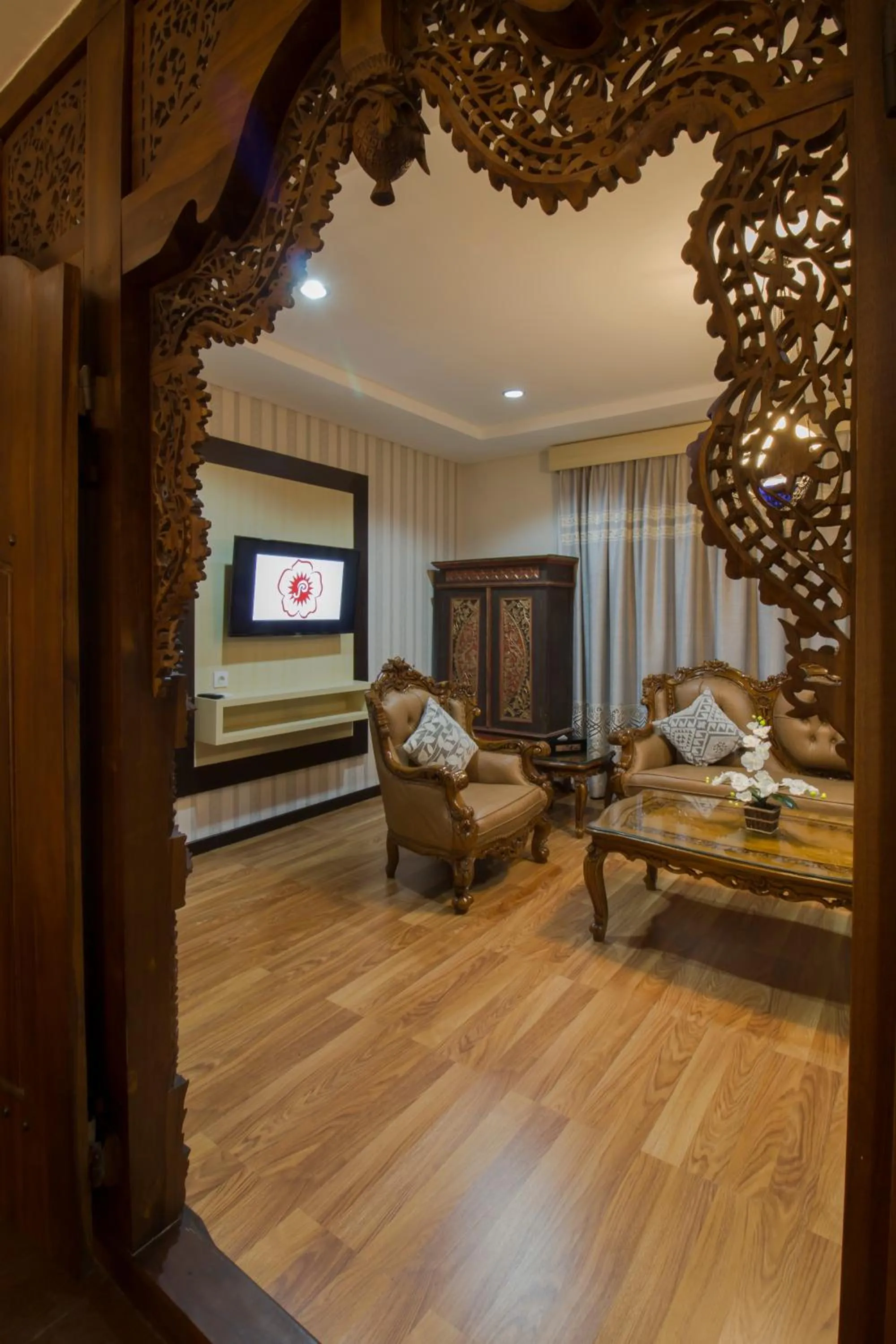 Living room in Grand Puri Saron Hotel Yogyakarta
