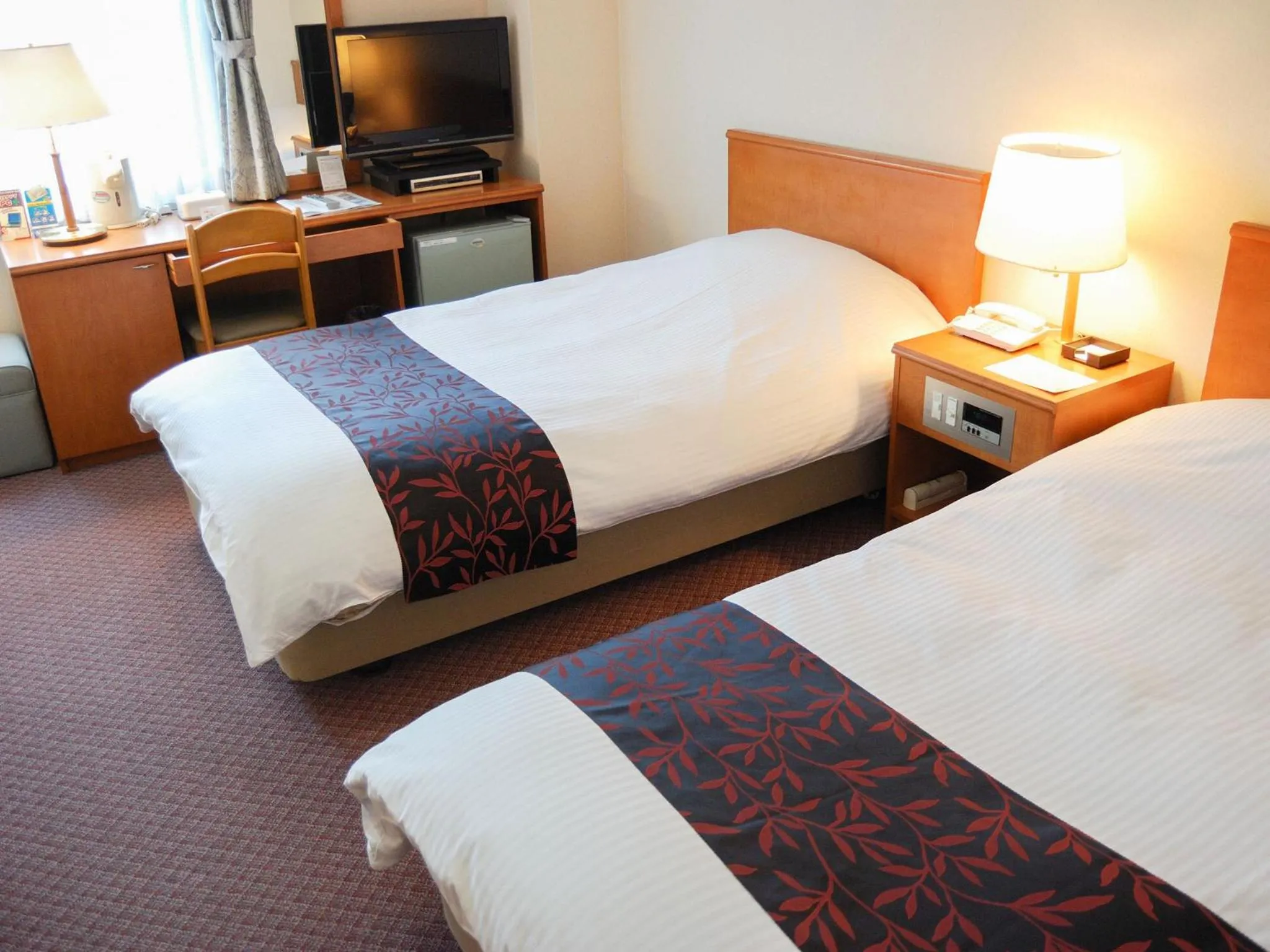 Photo of the whole room, Bed in Kobe City Gardens Hotel (Formally Hotel Kobe Shishuen)