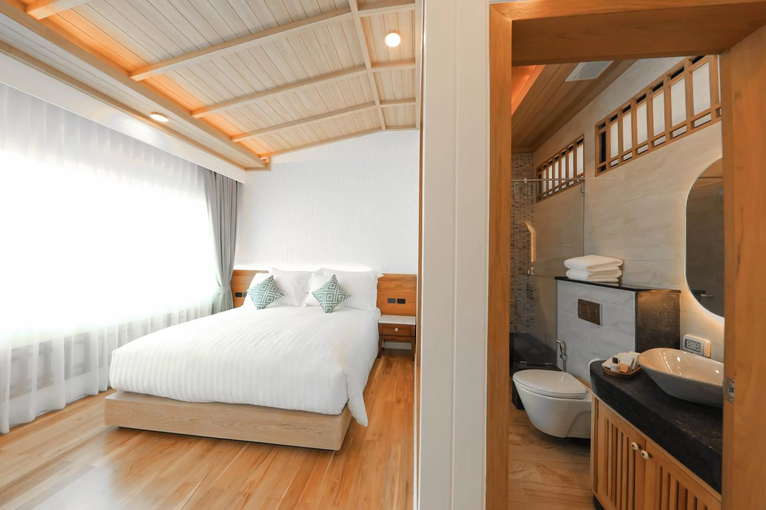 Bed in Kundala Beach Resort Hua Hin