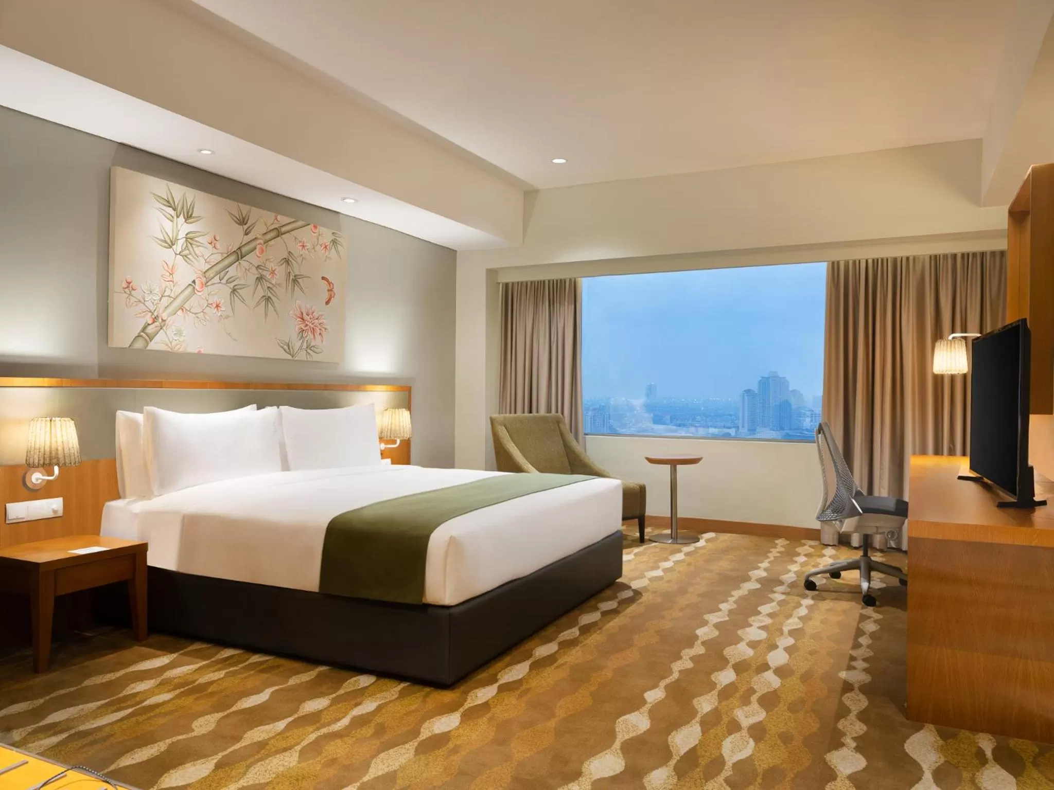 Photo of the whole room, Bed in Holiday Inn & Suites Jakarta Gajah Mada by IHG