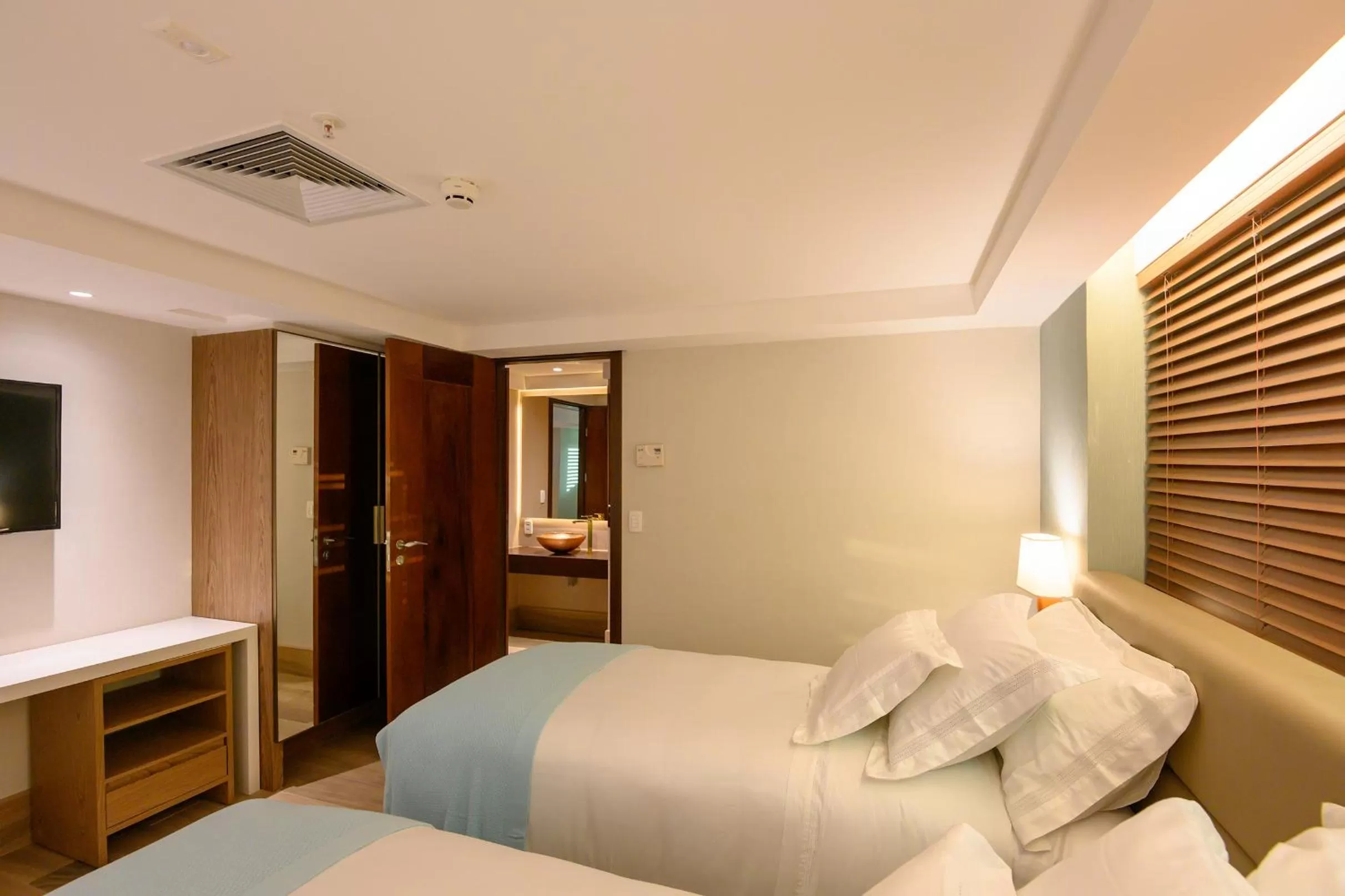 Bed in Vogal Luxury Beach Hotel & SPA