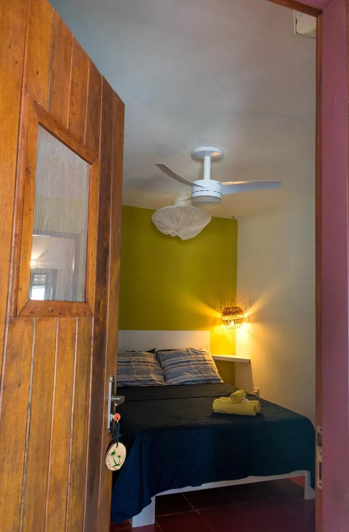 Bed in Pousada Casa Do Cocotier