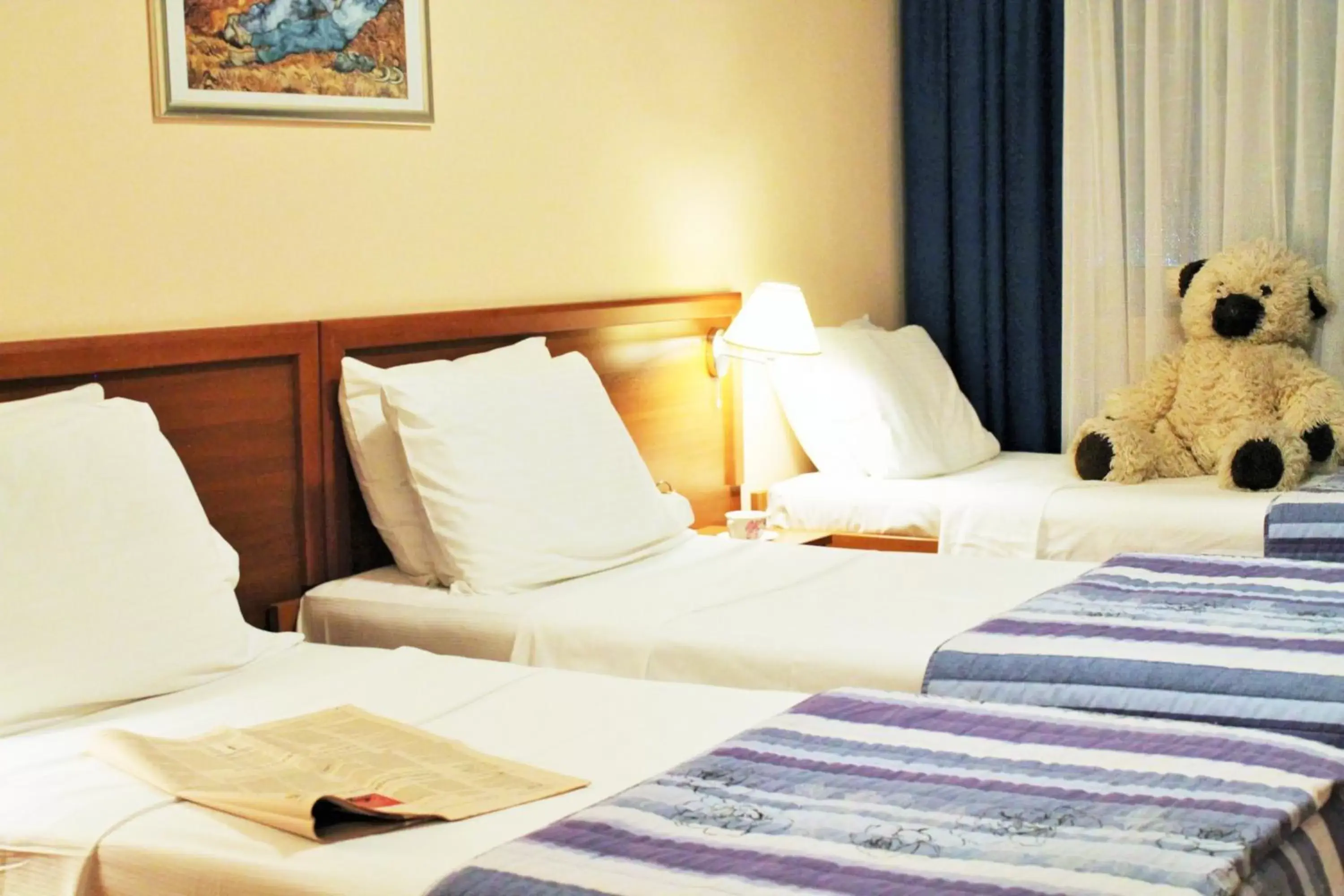 Triple Room in Hotel Rex Triple Room in Hotel Rex