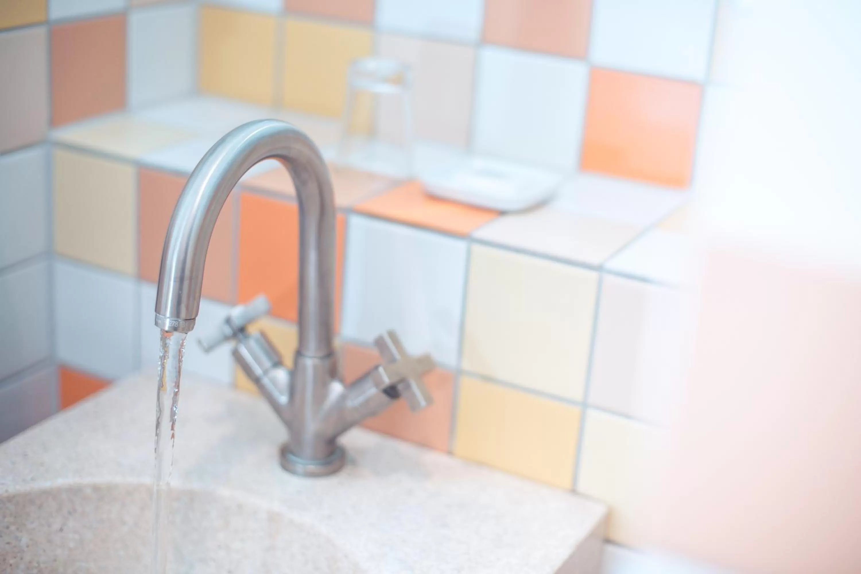 Bathroom in Hotel Bleibtreu Berlin by Golden Tulip