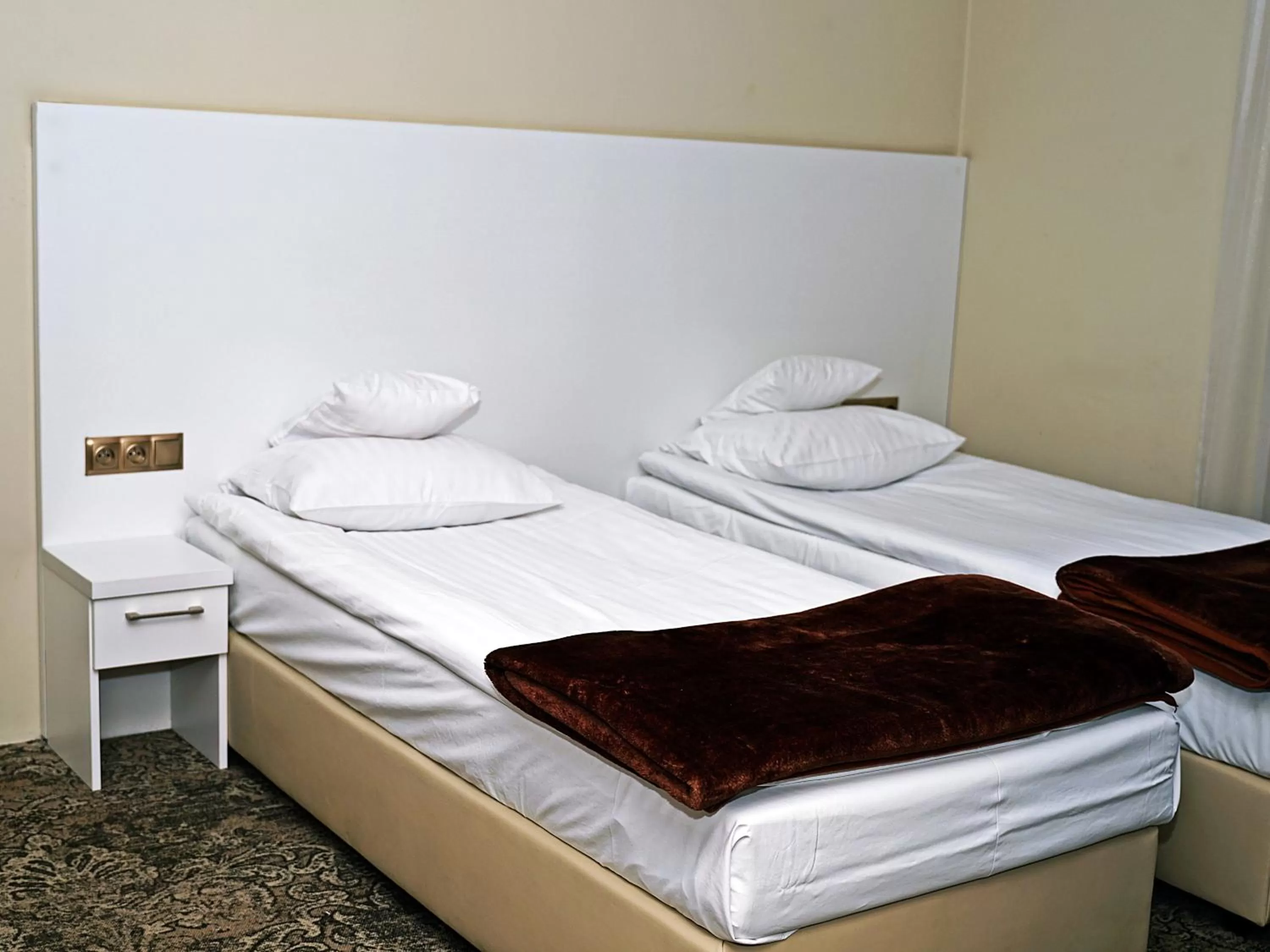 Bed in Hotel Promien