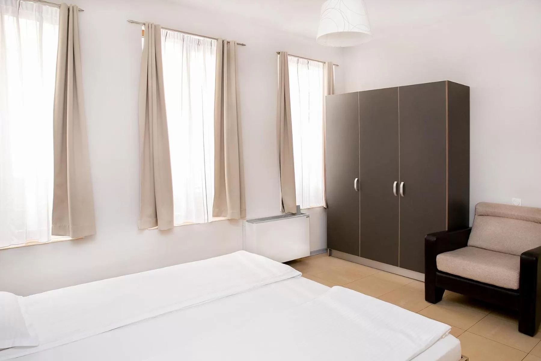 Seating area, Bed in Hotel Niky