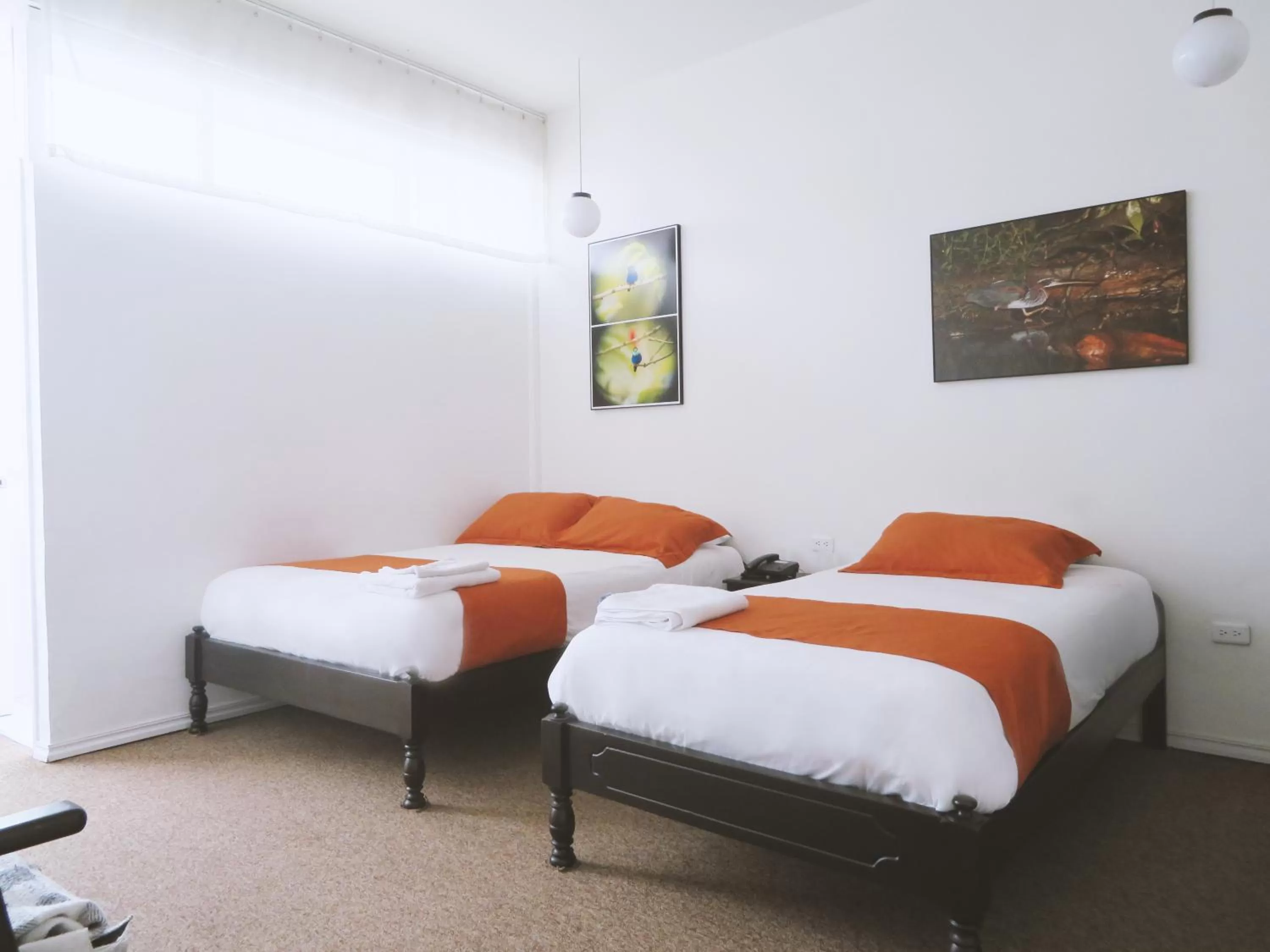 Bed in Bird Garden Guest House