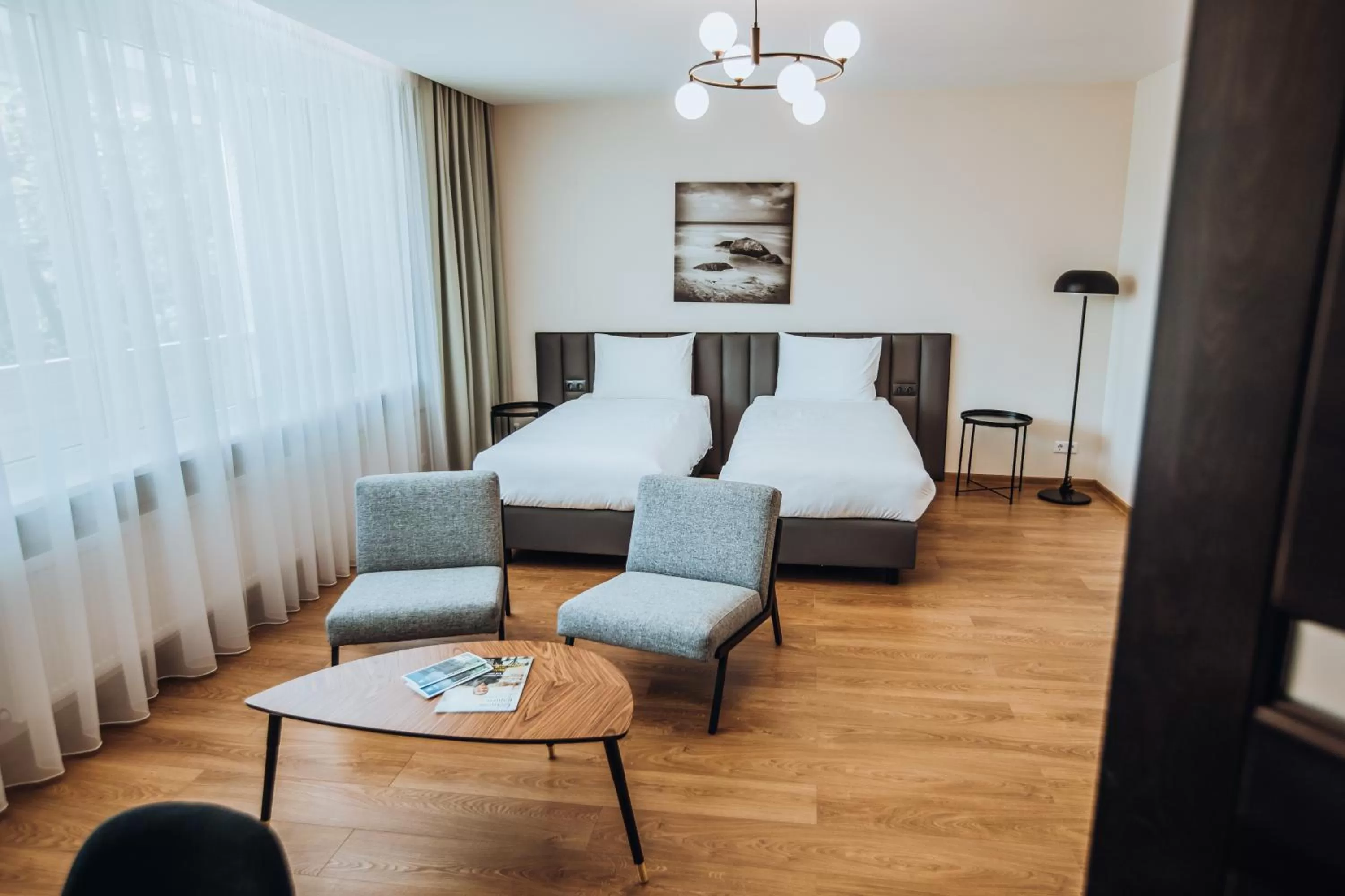 Living room, Bed in Žilvinas Hotel