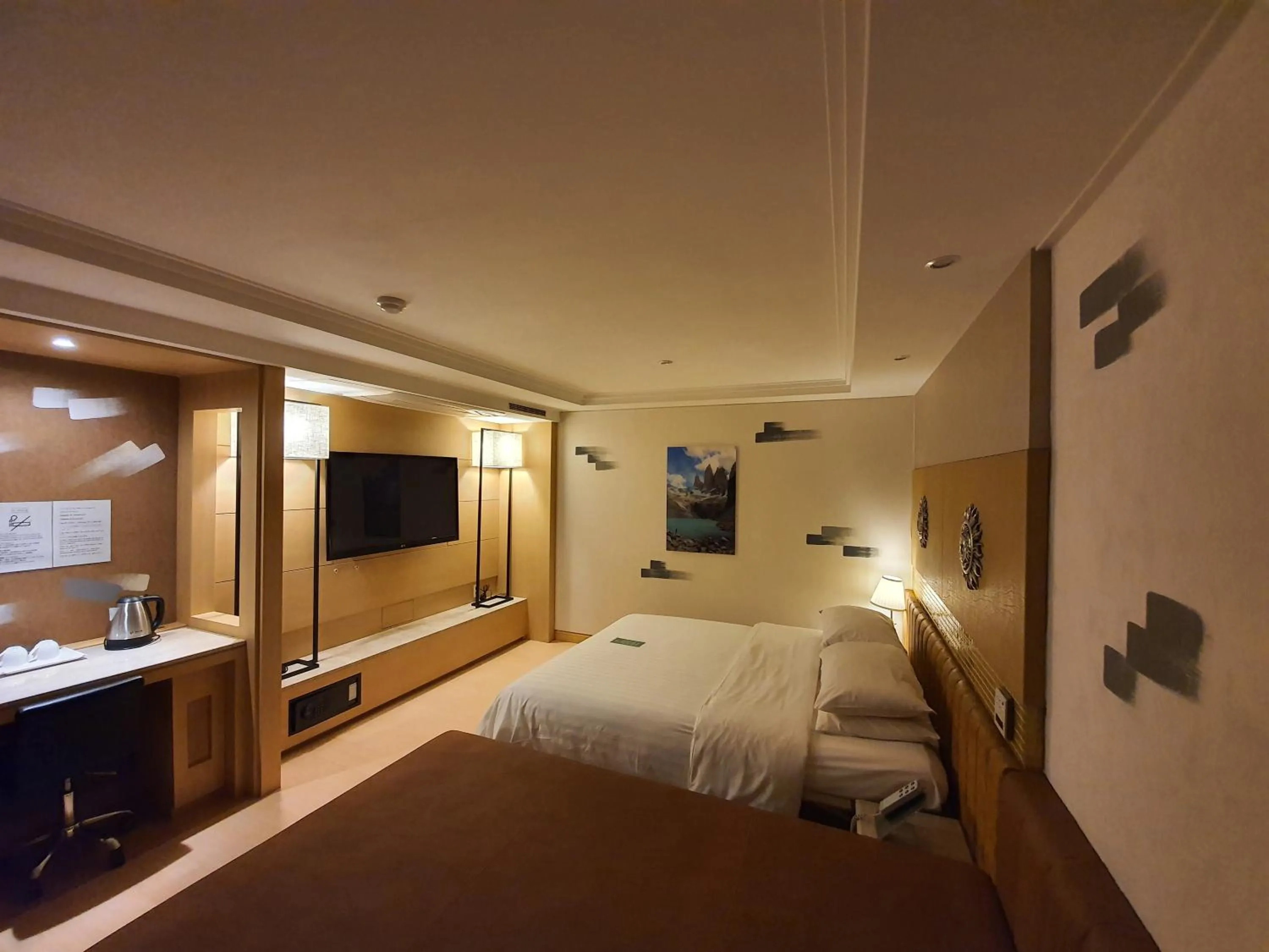 Bed in Friendly DH Naissance Hotel by Mindrum Group