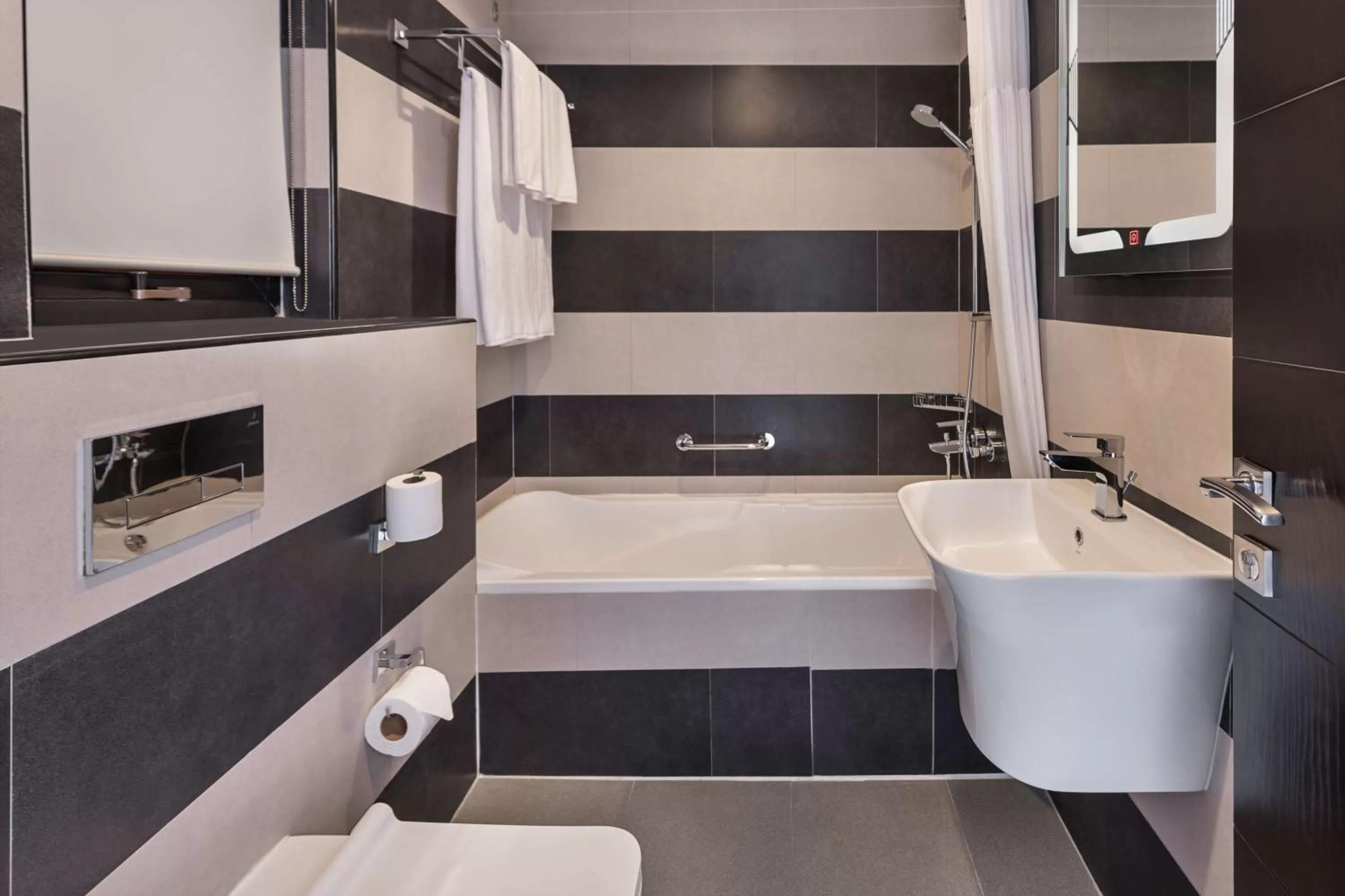 Toilet in Radisson Blu Hotel & Resort, Al Ain