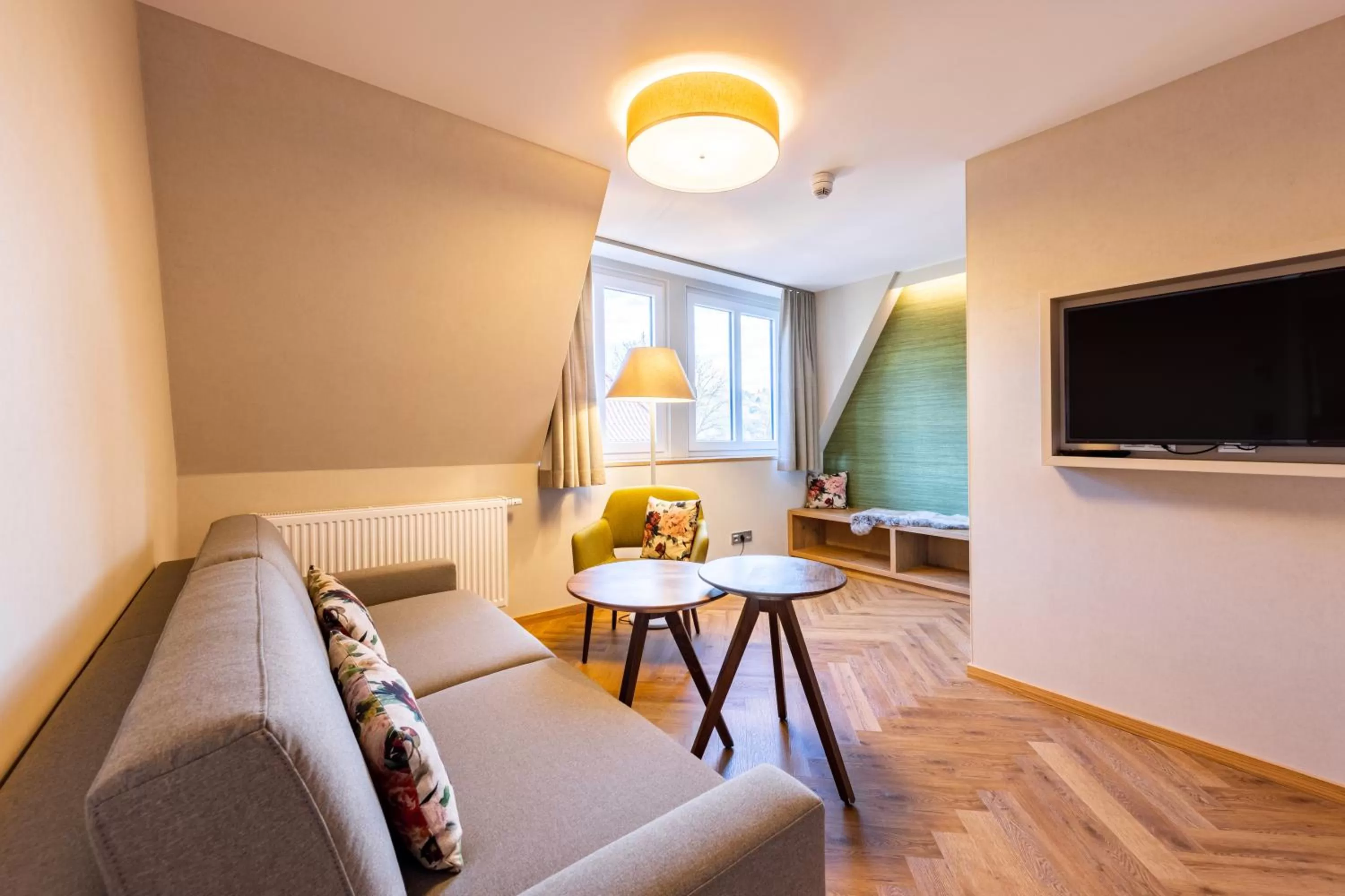 Communal lounge/ TV room in Parkhotel Güldene Berge