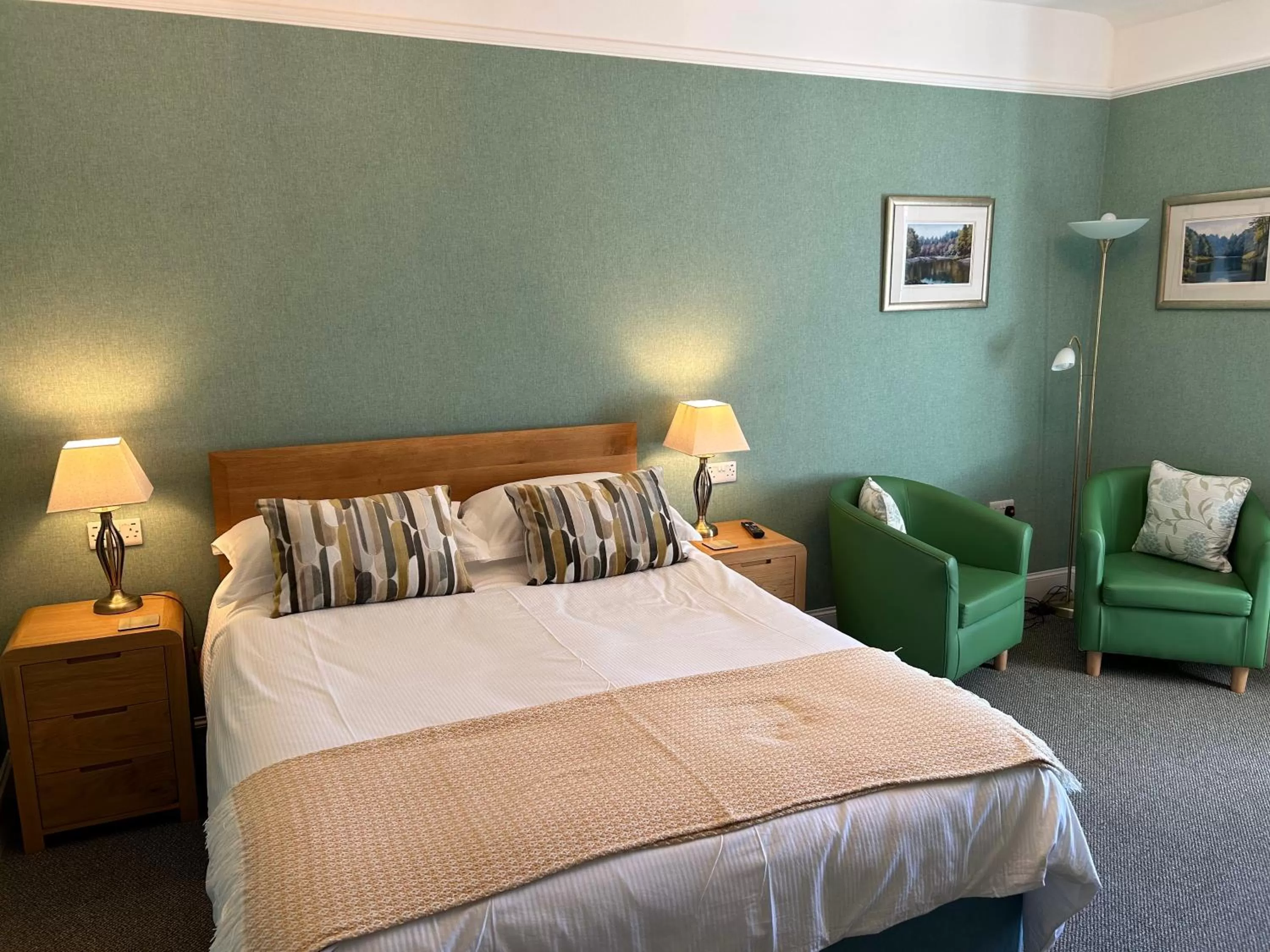 Seating area, Bed in West End Guest House