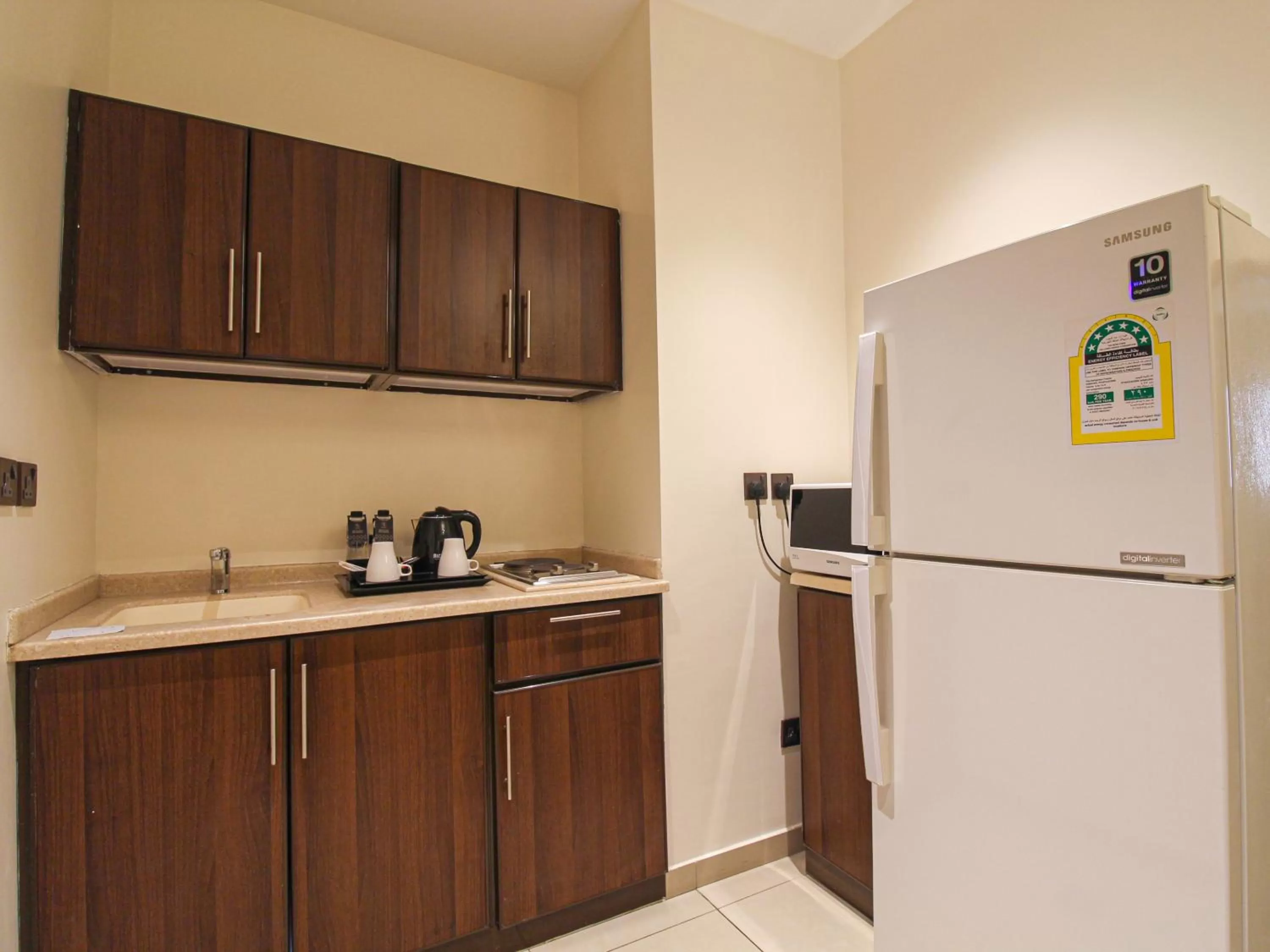 Kitchen/Kitchenette in Friesian Hotel Suites