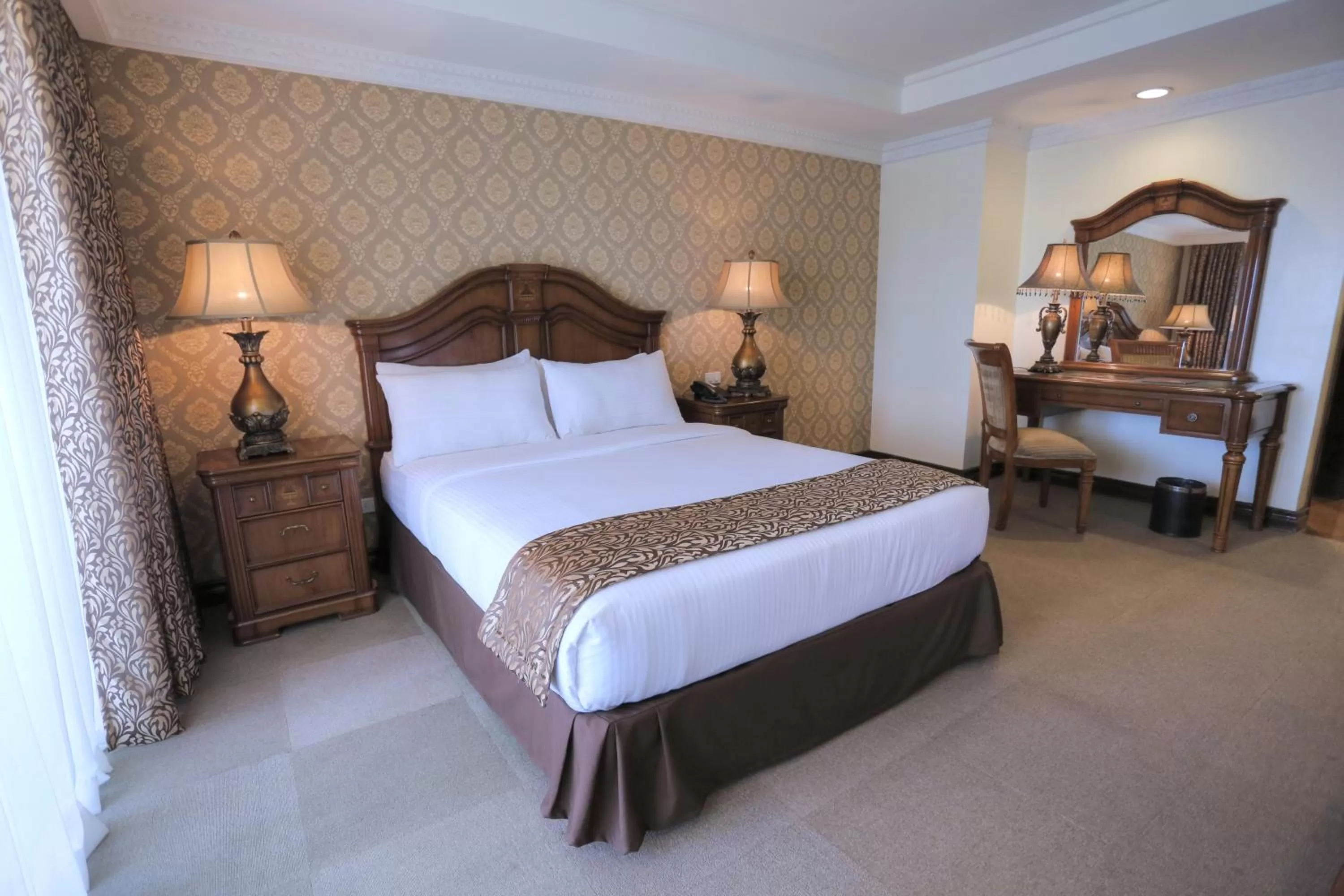 Bed in Villa Caceres Hotel