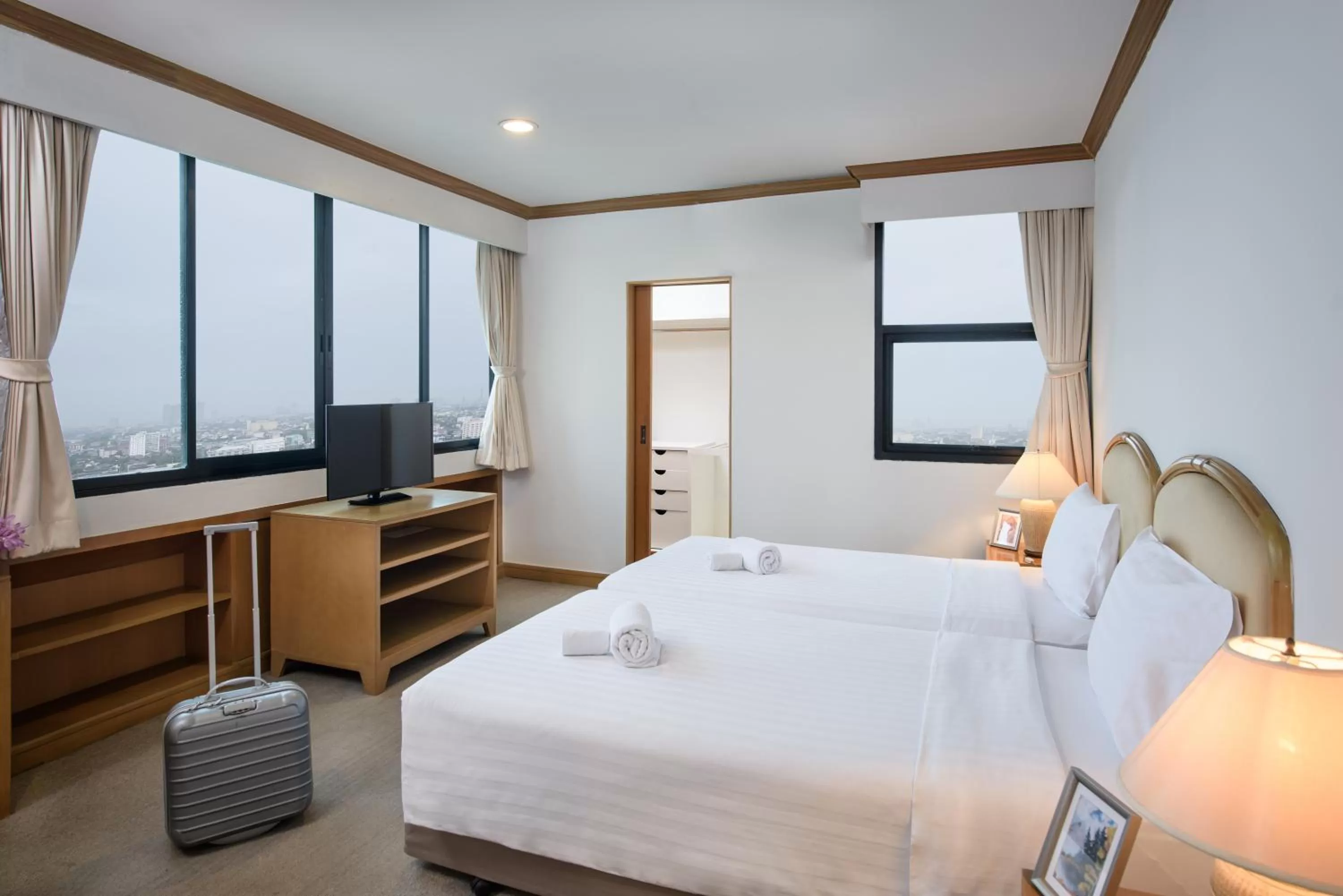 Bed in Riverine Place Hotel and Residence