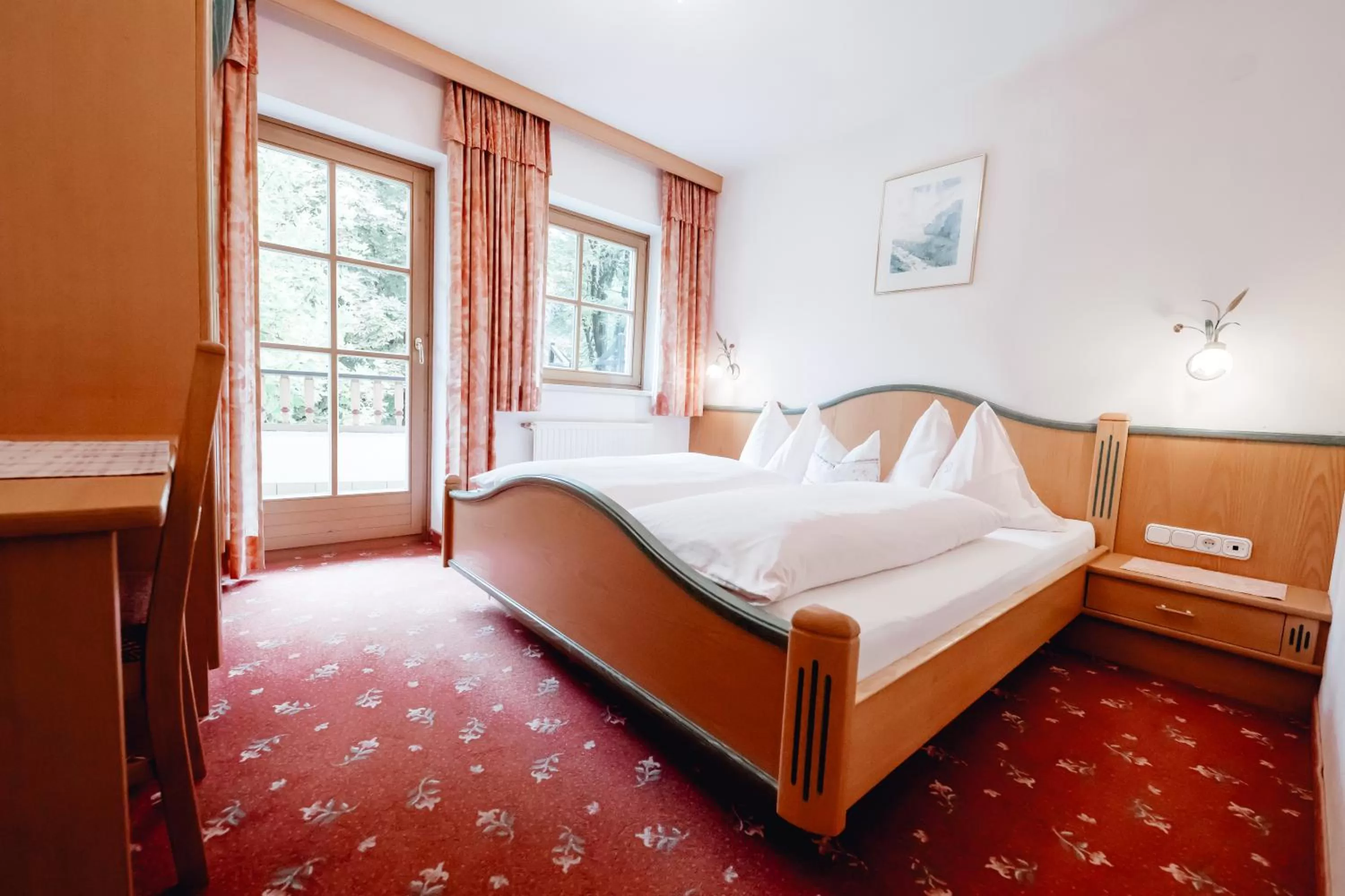 Bed in Dandler - Zimmer und Ferienwohnungen