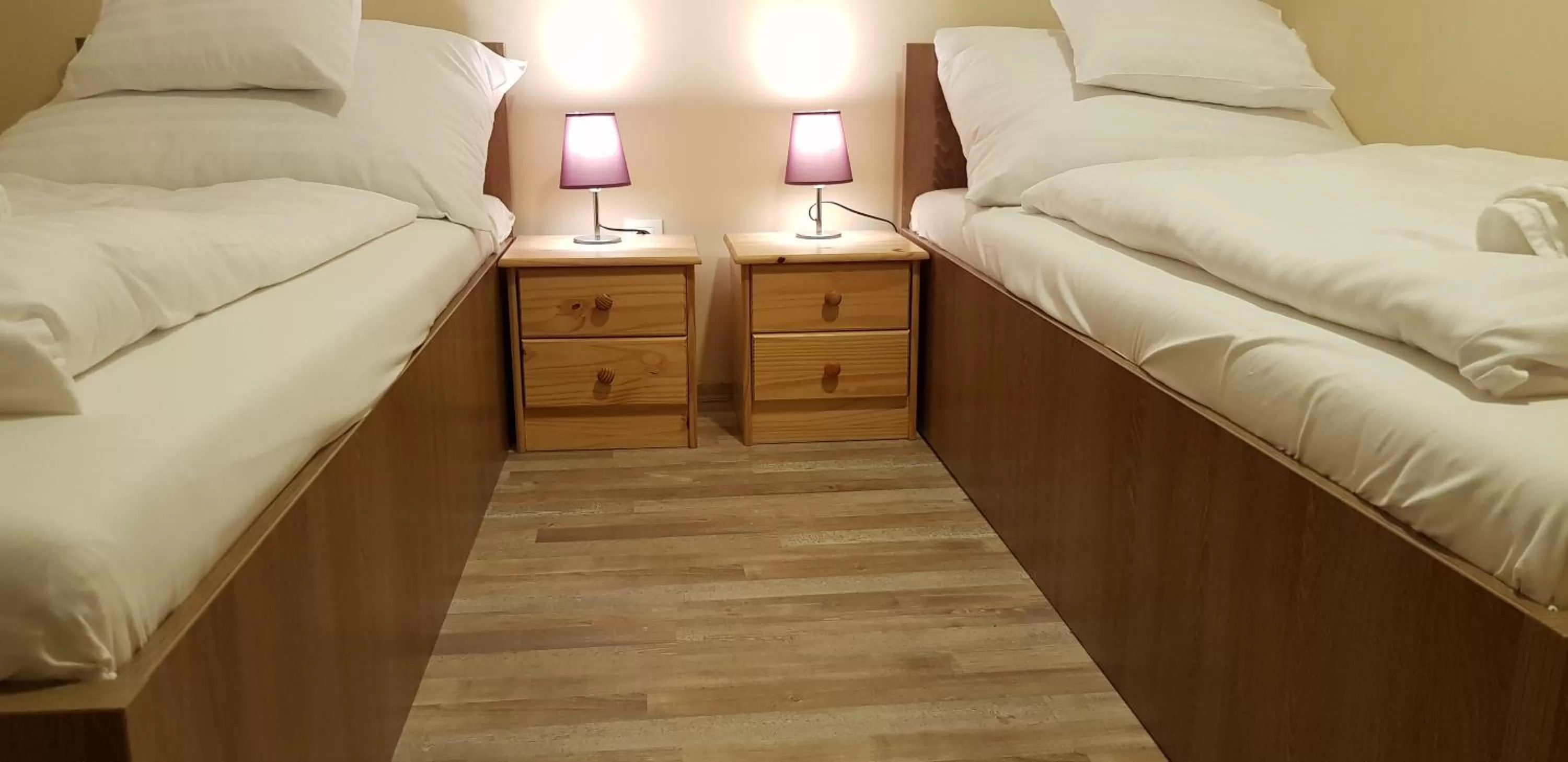 Bed in Central Panzió Gyula