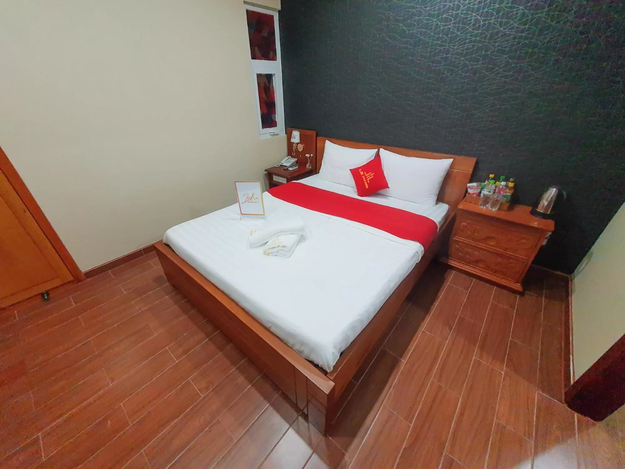 Bed in LEHA Saigon Hotel Airport