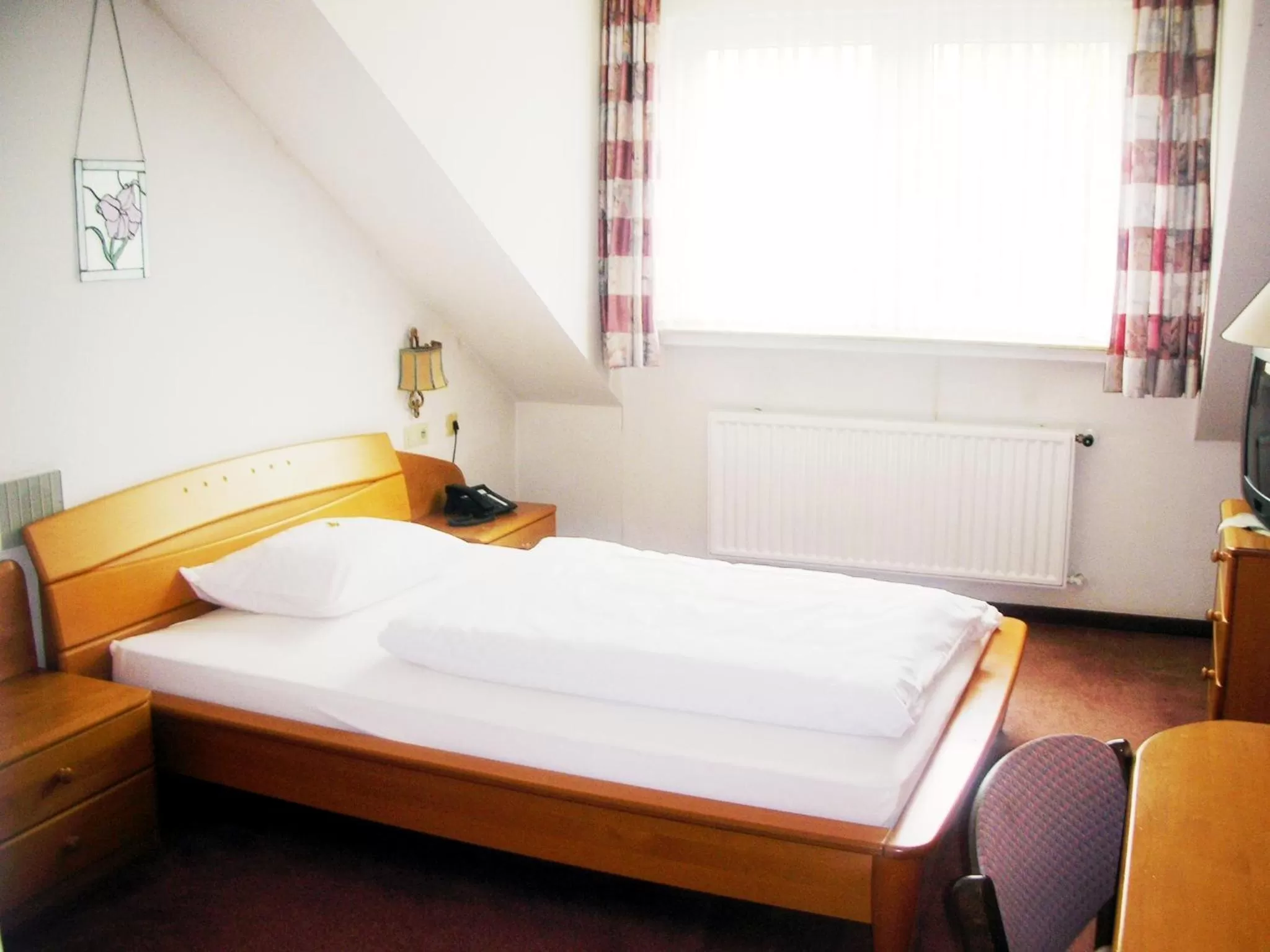 Bed in Heidehotel Hildfeld