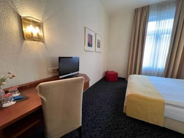 Photo of the whole room in Stadthotel