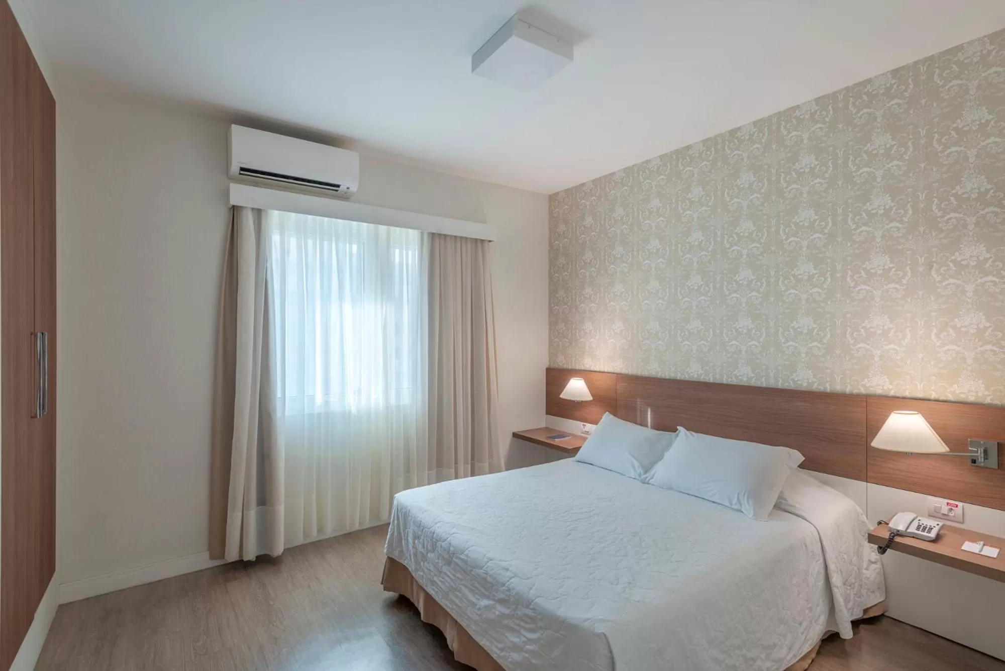 Bed in Hotel Glória