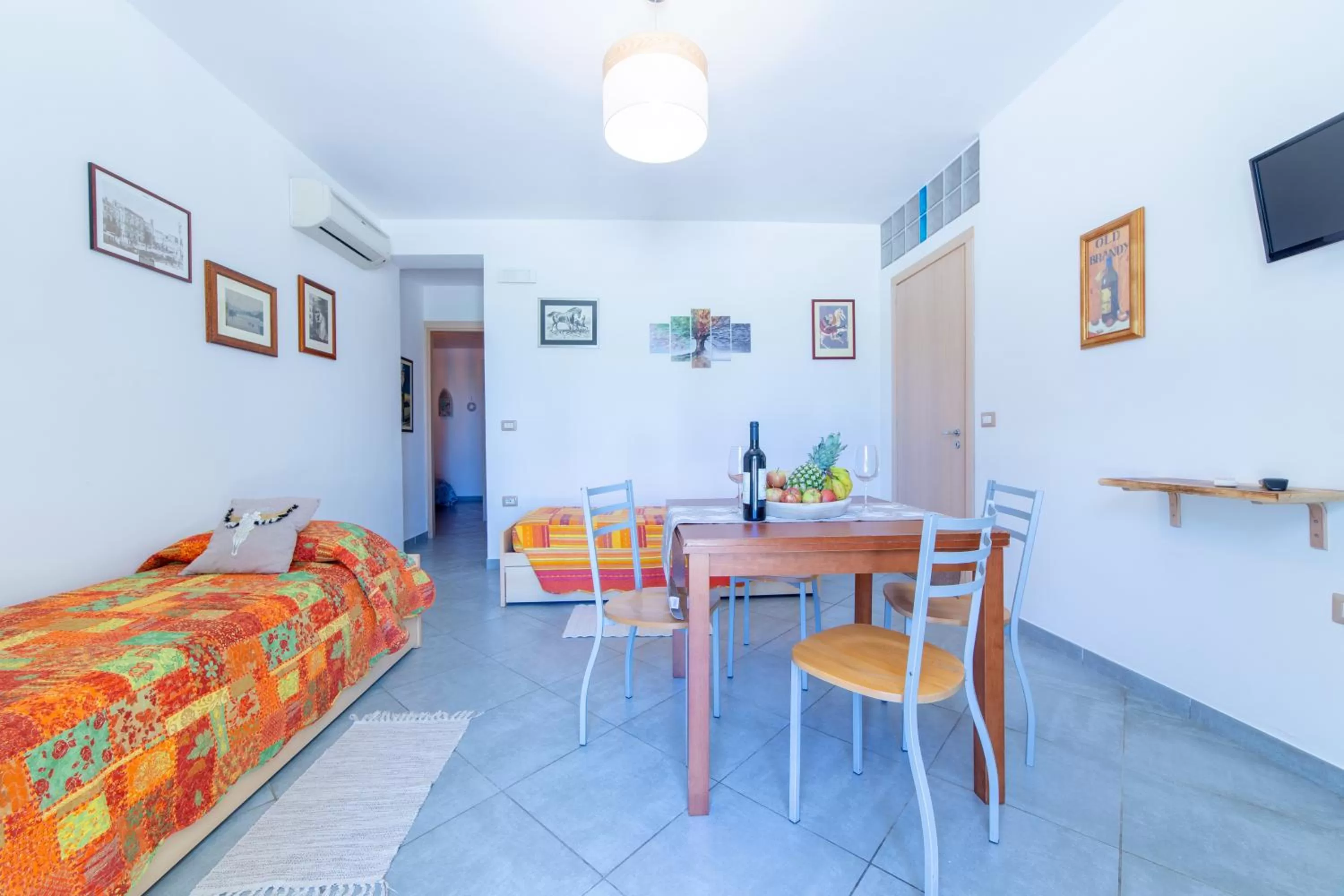 Living room, Bed in Tenuta Don Carmelo