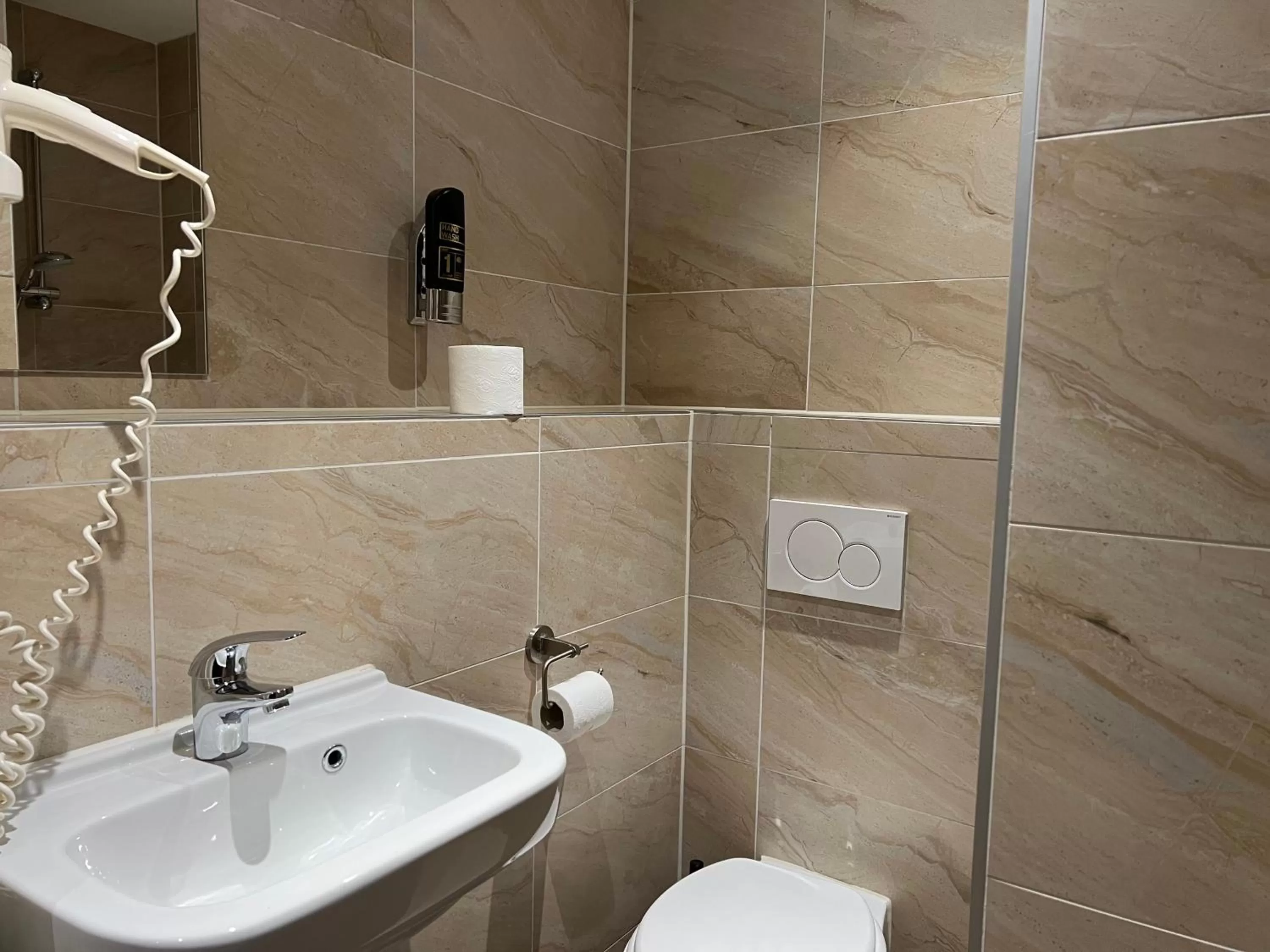 Bathroom in Blossoms City Hotel