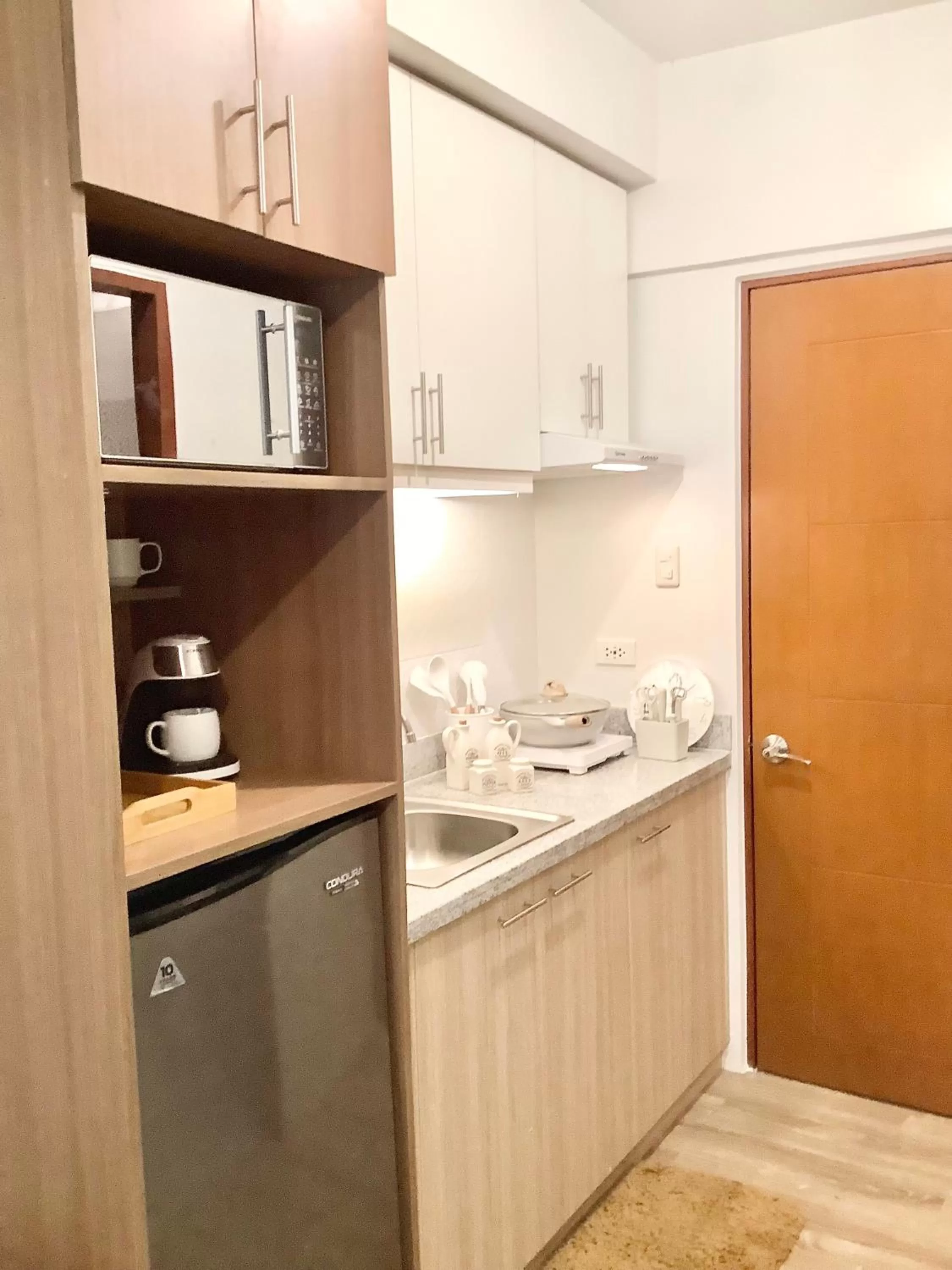 Kitchen or kitchenette in AZRA Bacolod at Mesavirre Garden Residences