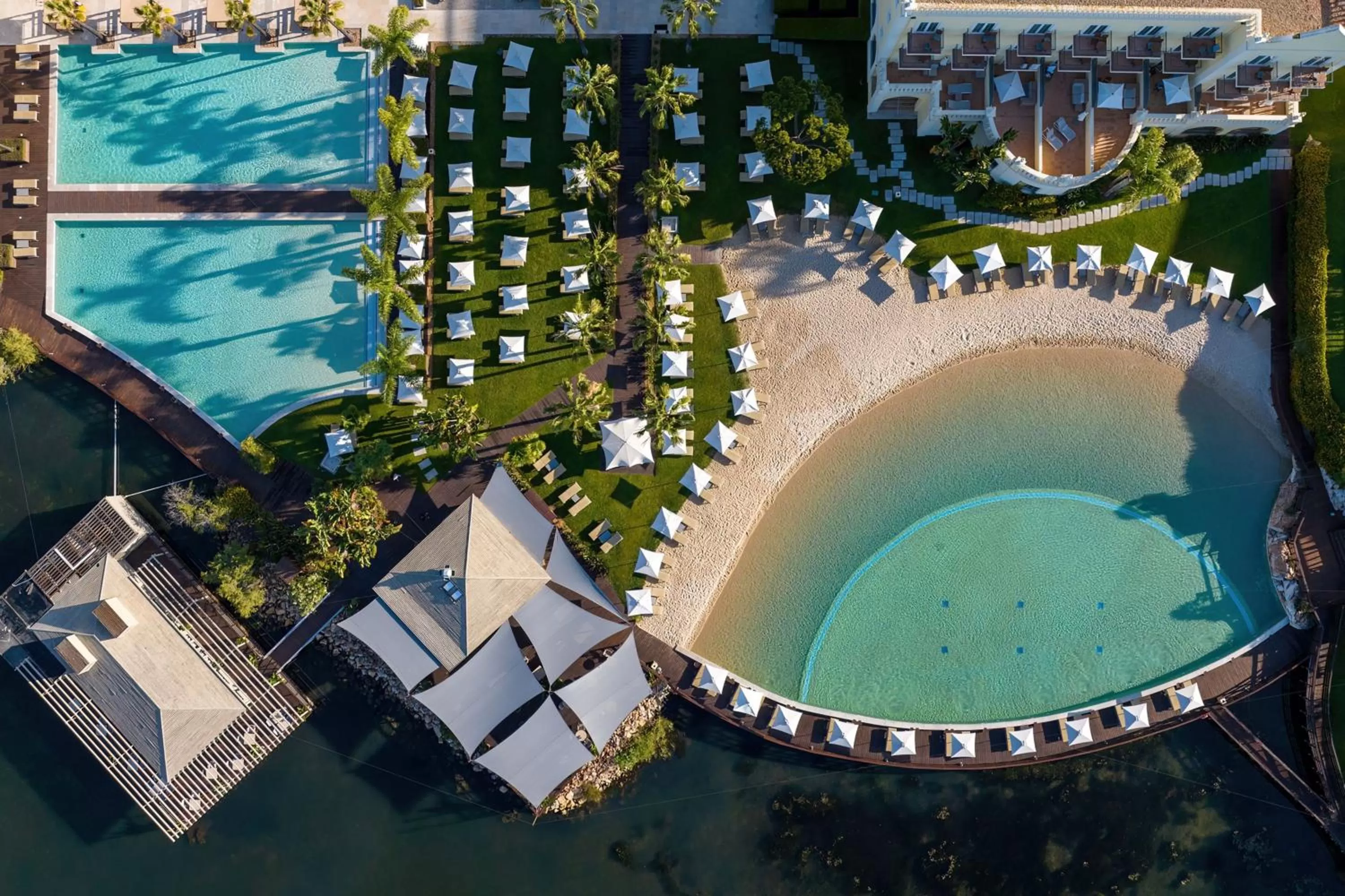 Swimming pool in Domes Lake Algarve, Autograph Collection