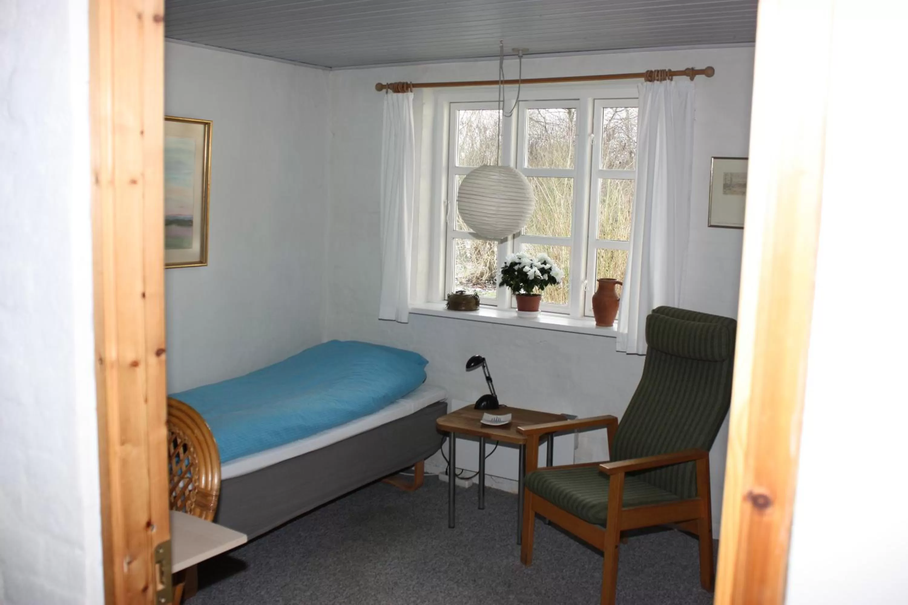 Bed in Holmehuset Bed & Breakfast