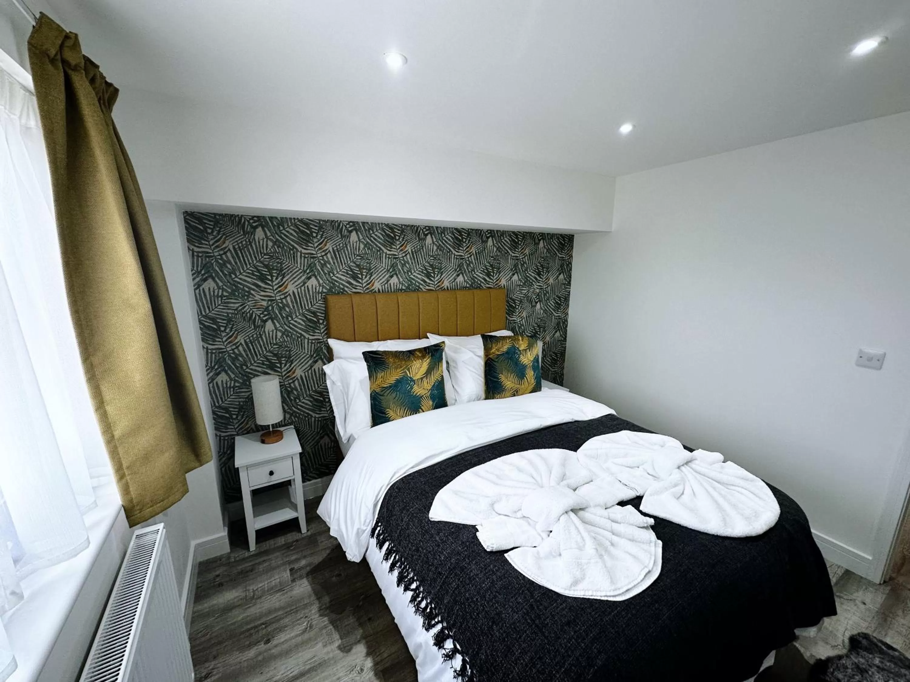 Bed in The Atlantis - Tower Apartments