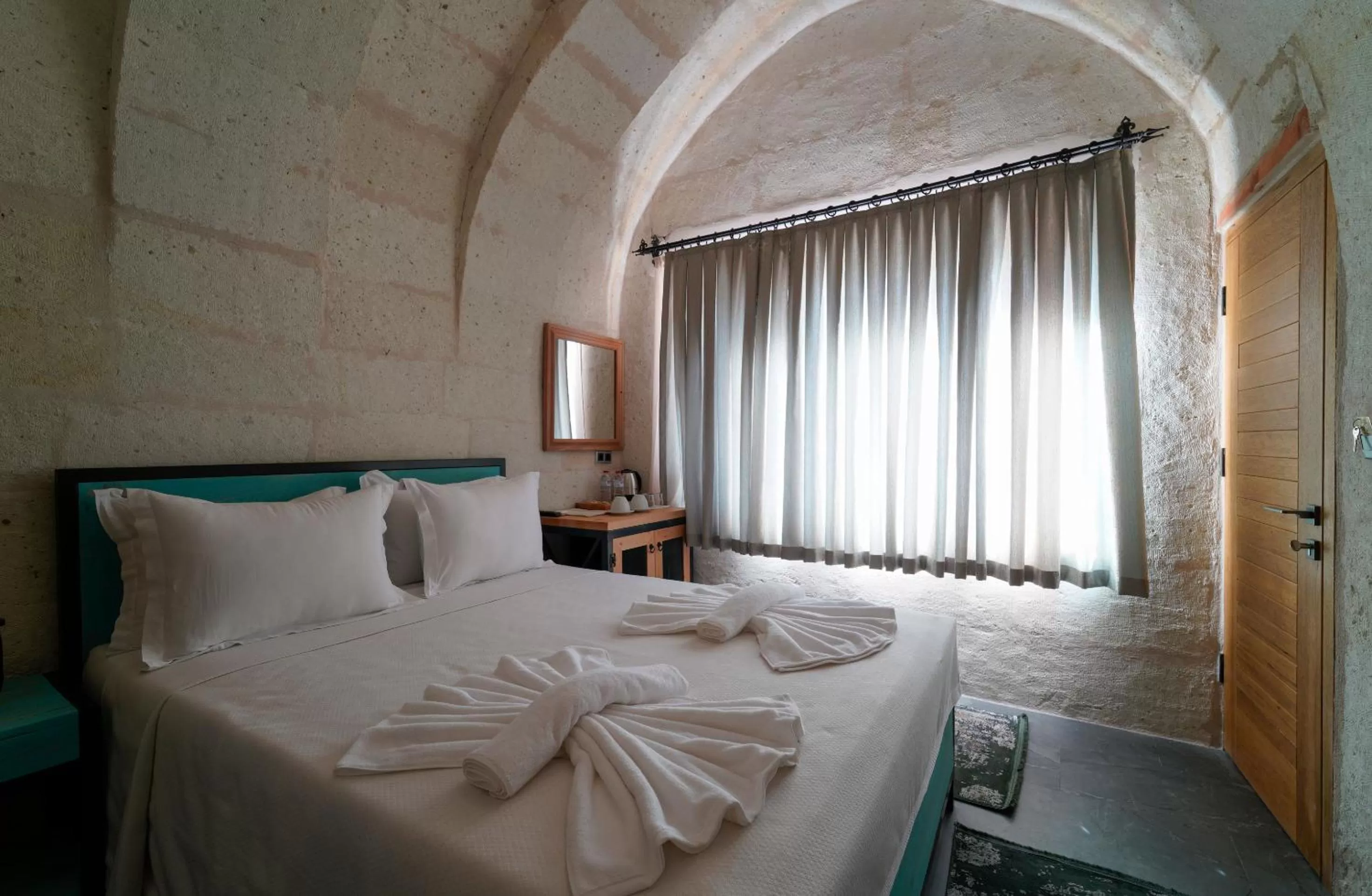 Bed in The Niche Cave Hotel