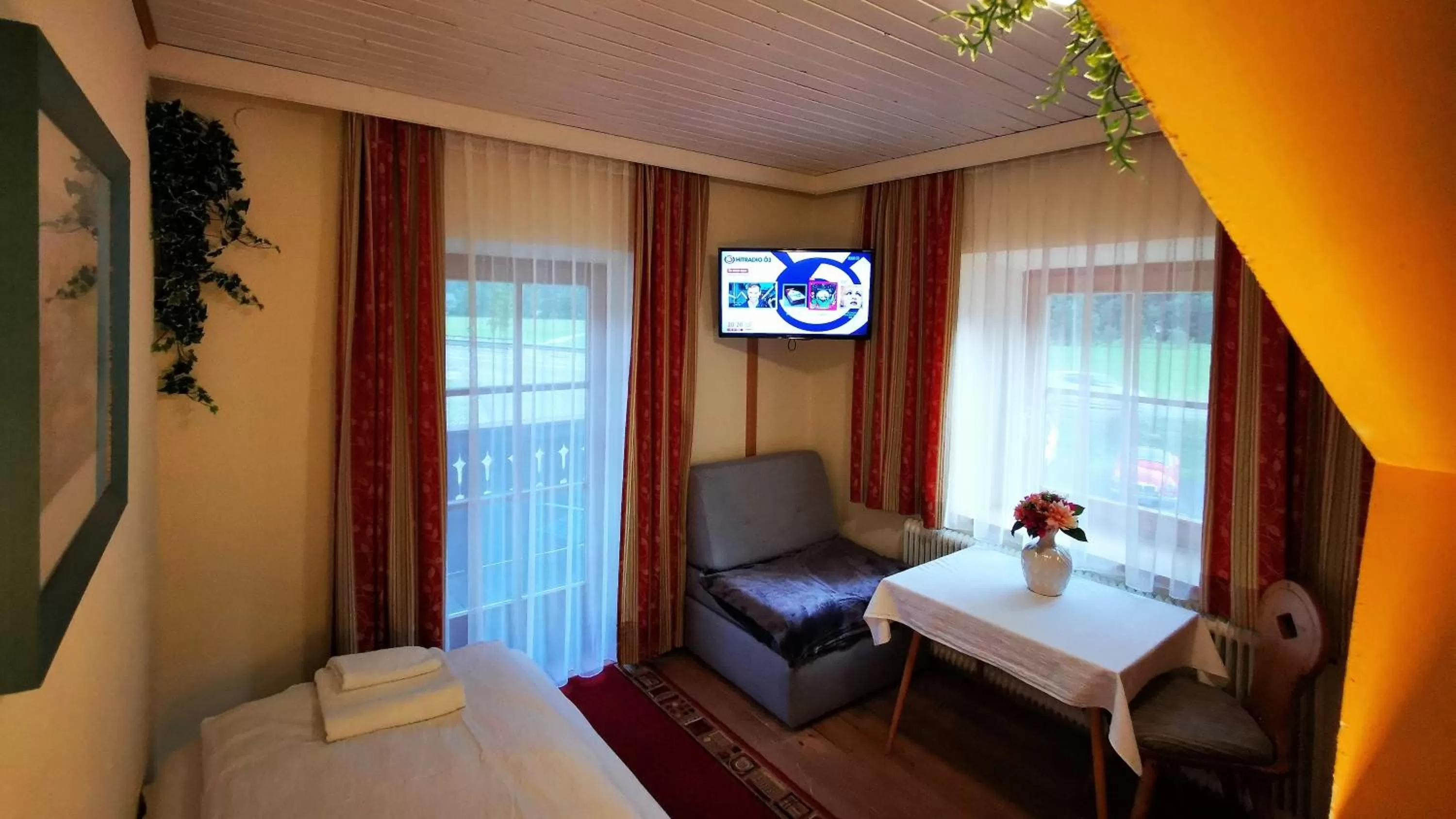 Bed, Seating Area in Gasthof Geronimo