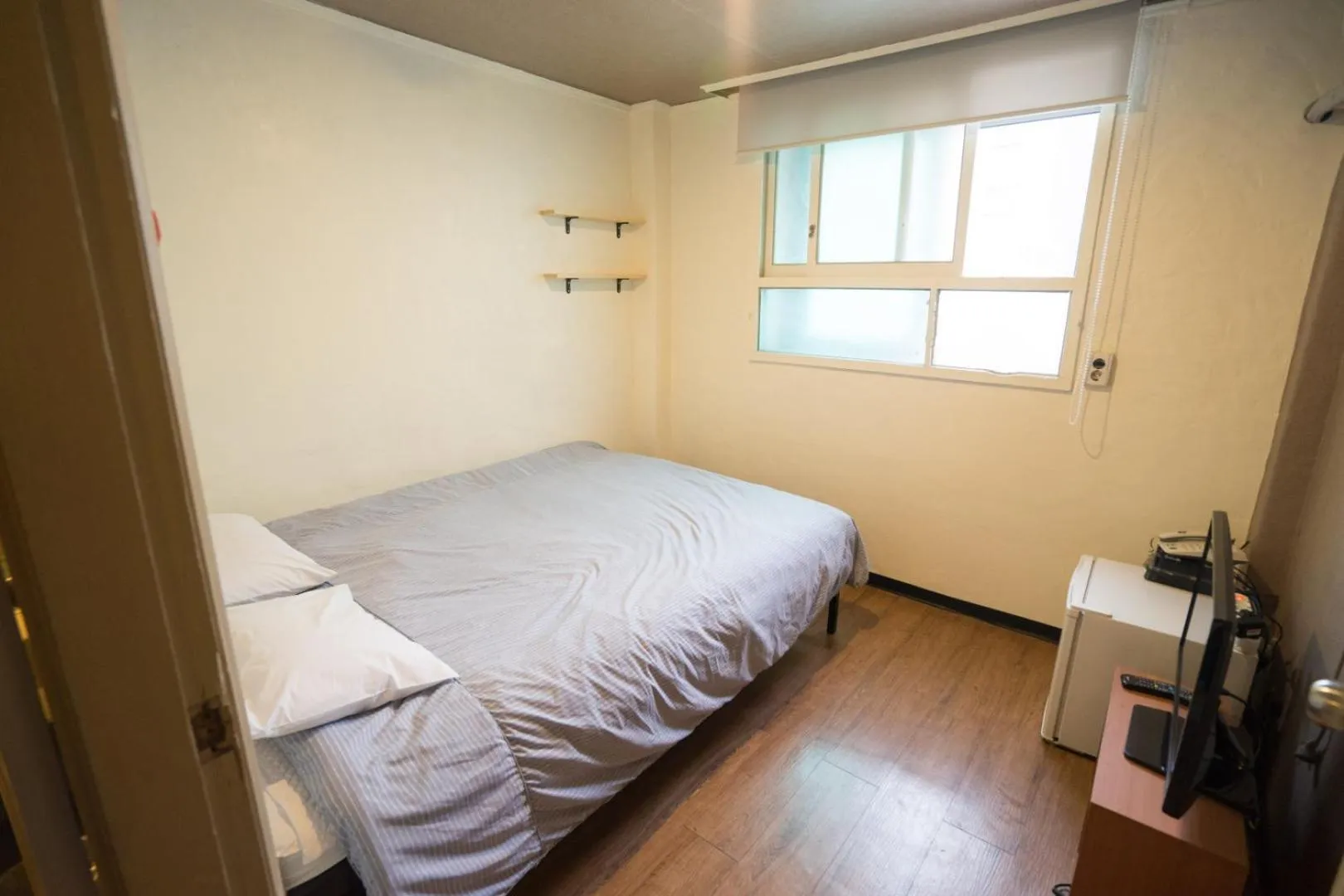 Bed in Beewon Guesthouse