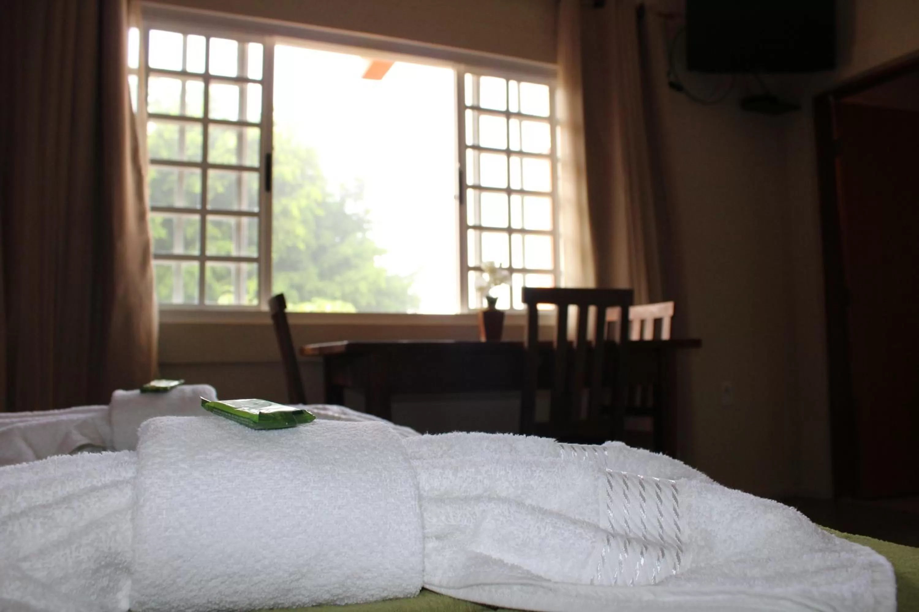 Bed in Pousada Morro dos Ventos