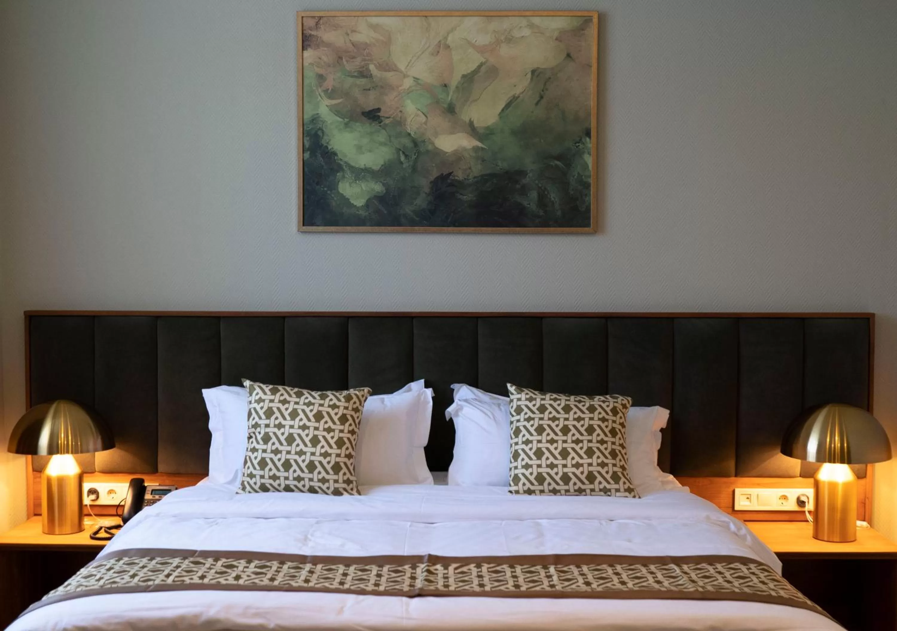 Bed in Grand Opera Hotel