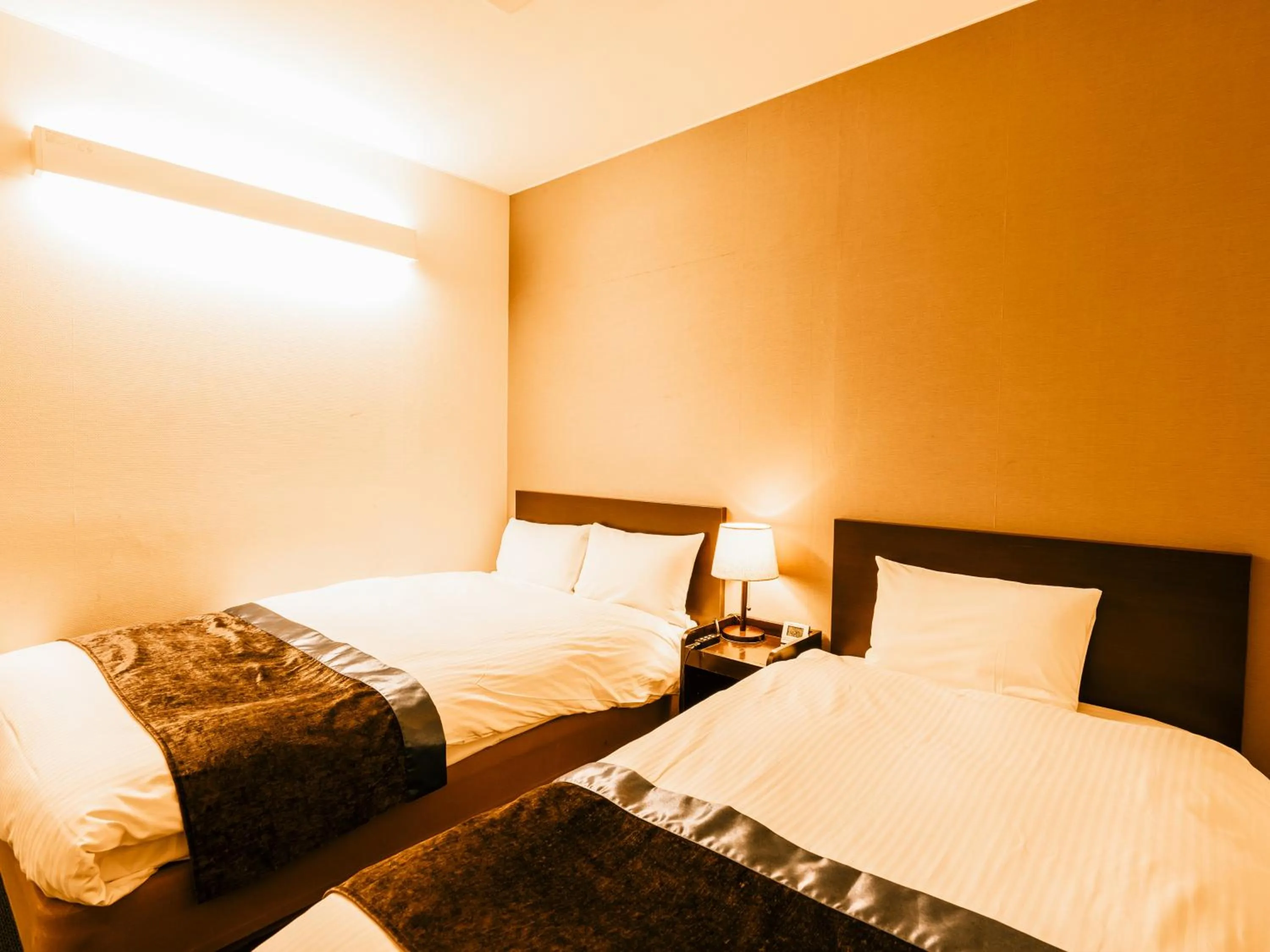 Photo of the whole room, Bed in Hotel AreaOne Takamatsu