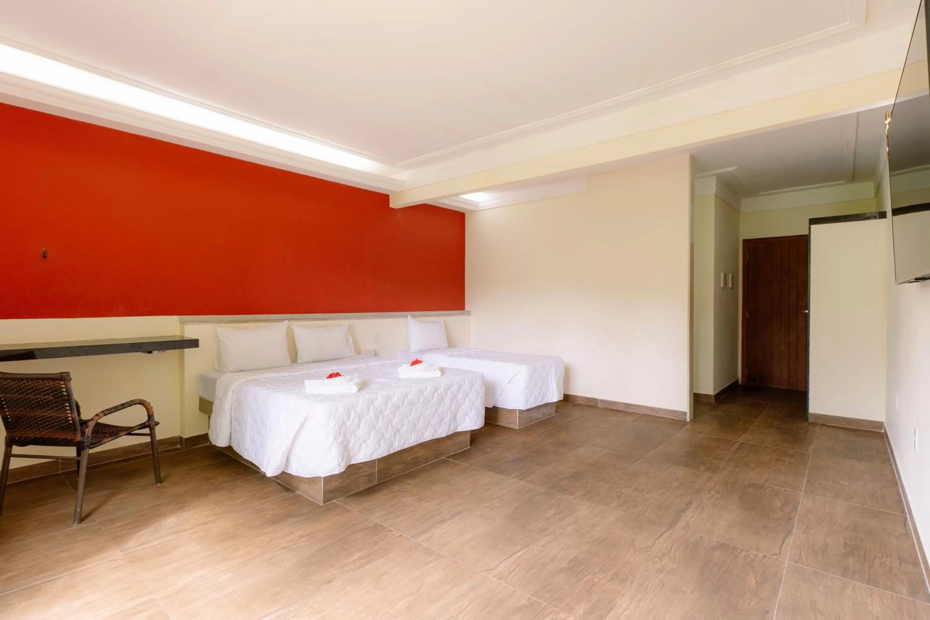 Bed in Floral Inn Family