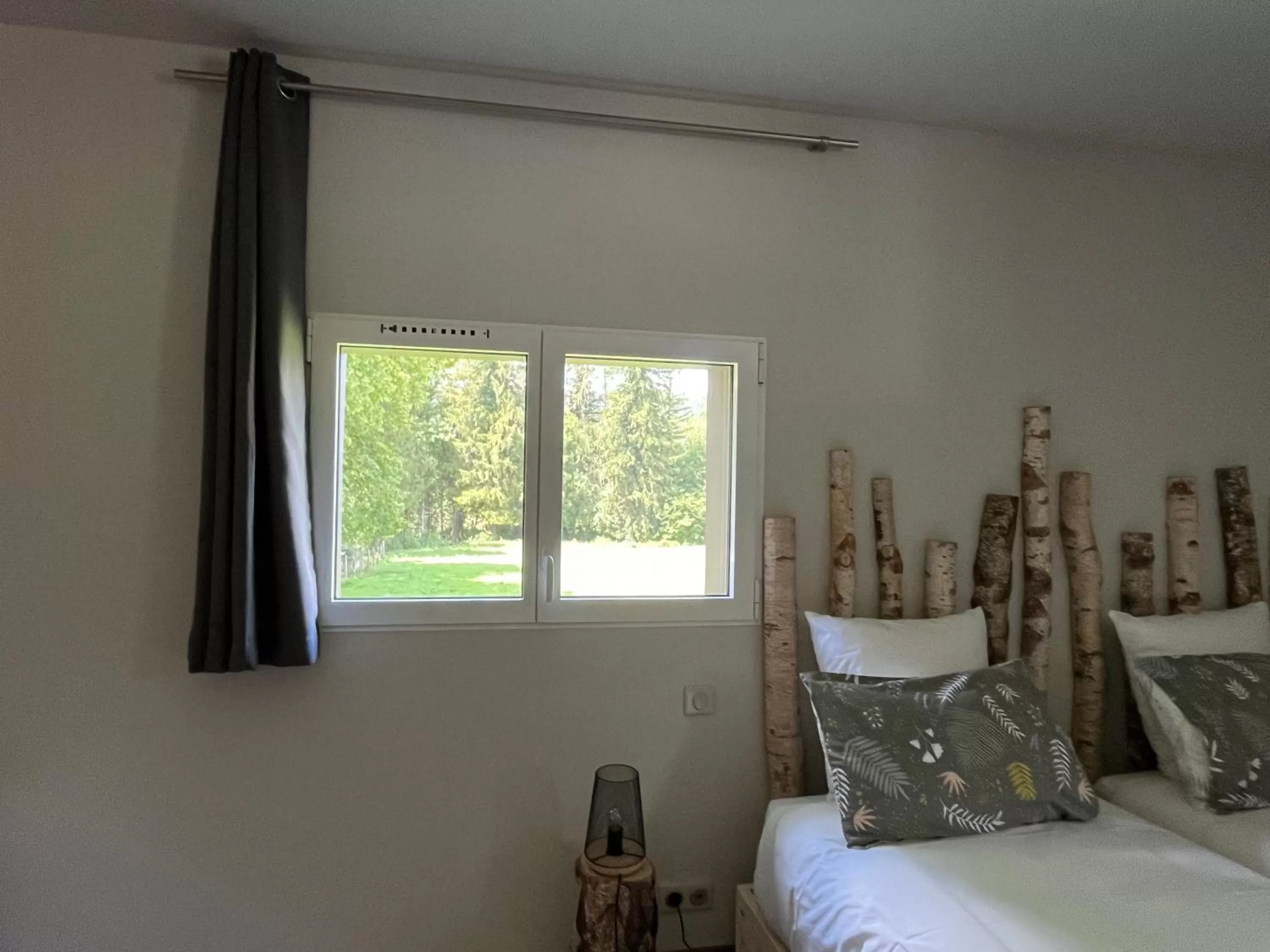 Bed in Hôtel En Tilleul