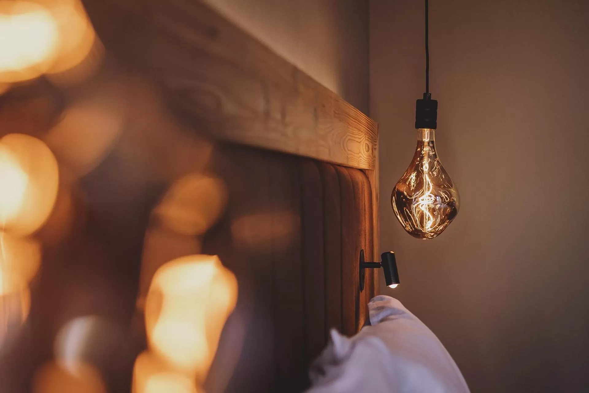 Bed in POST POST Hotel - Alpine Boutique Hotel & Spa