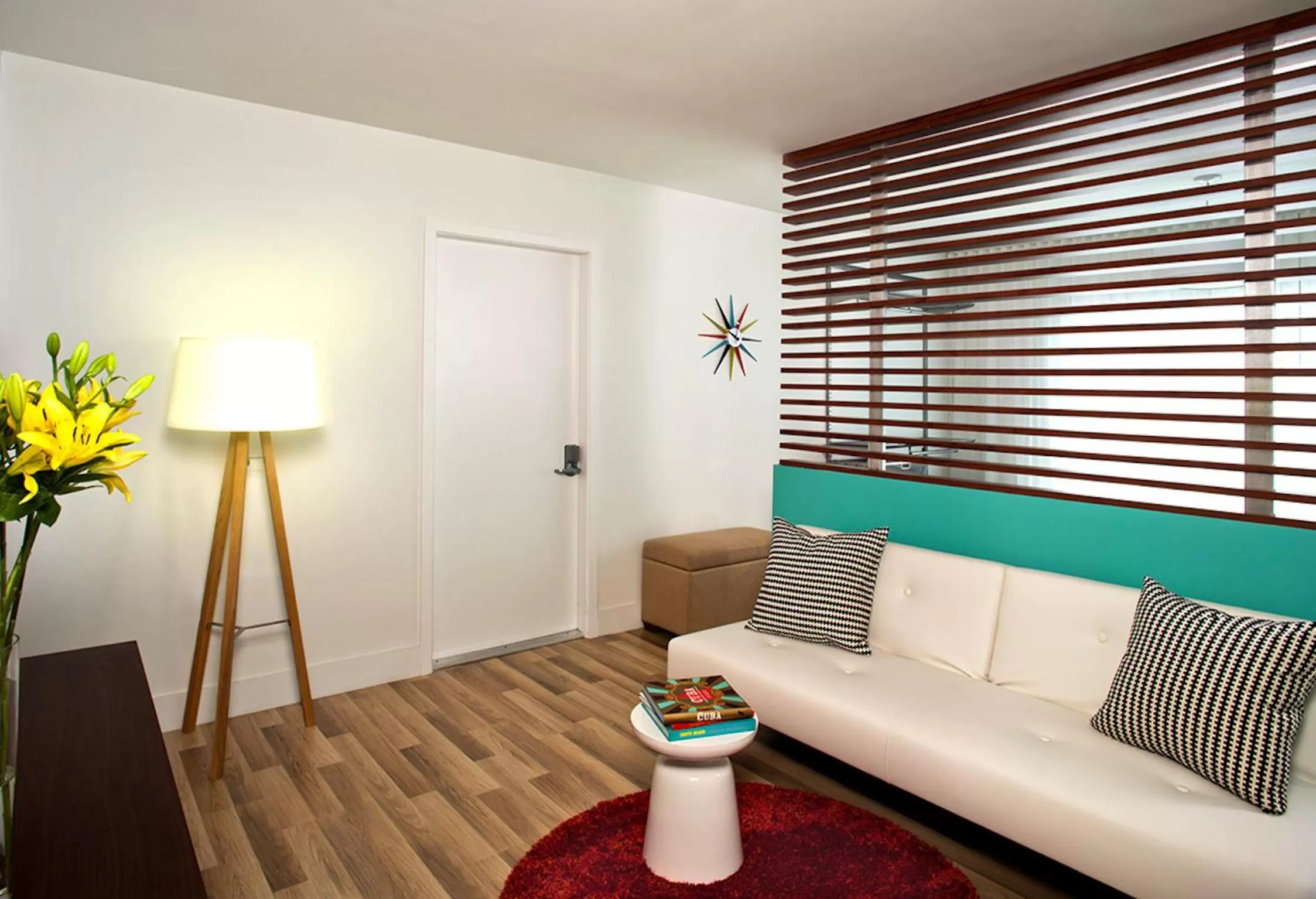 Living room in 1818 Meridian House Apartments and Suites by Eskape Collection