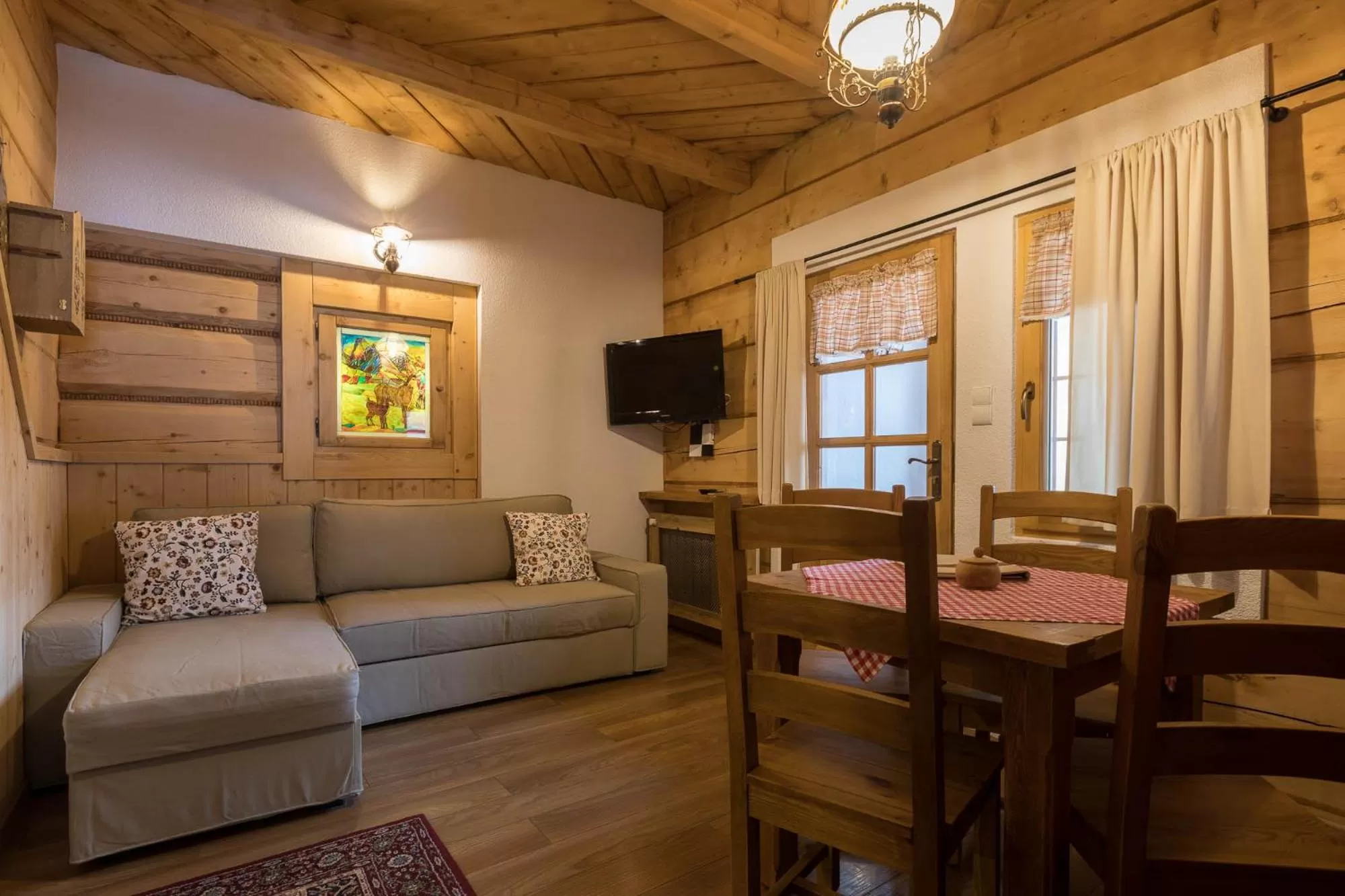 Bed, Seating Area in Bambi Cottage