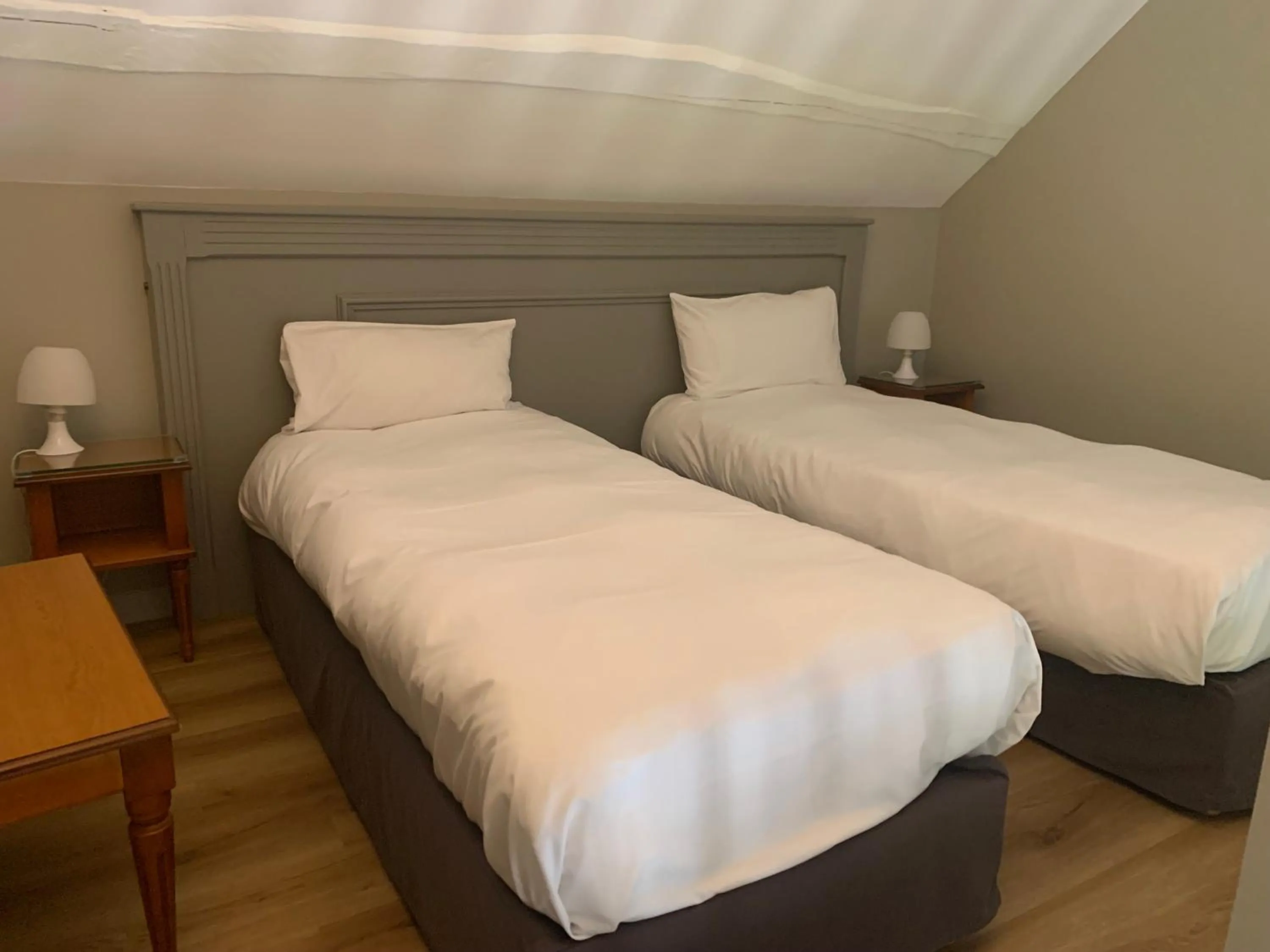 Bed in Logis Hôtel Restaurant Le Moulin de la Coudre