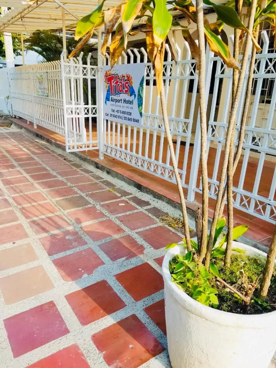 Property Logo/Sign in Tita’s Airport Hotel