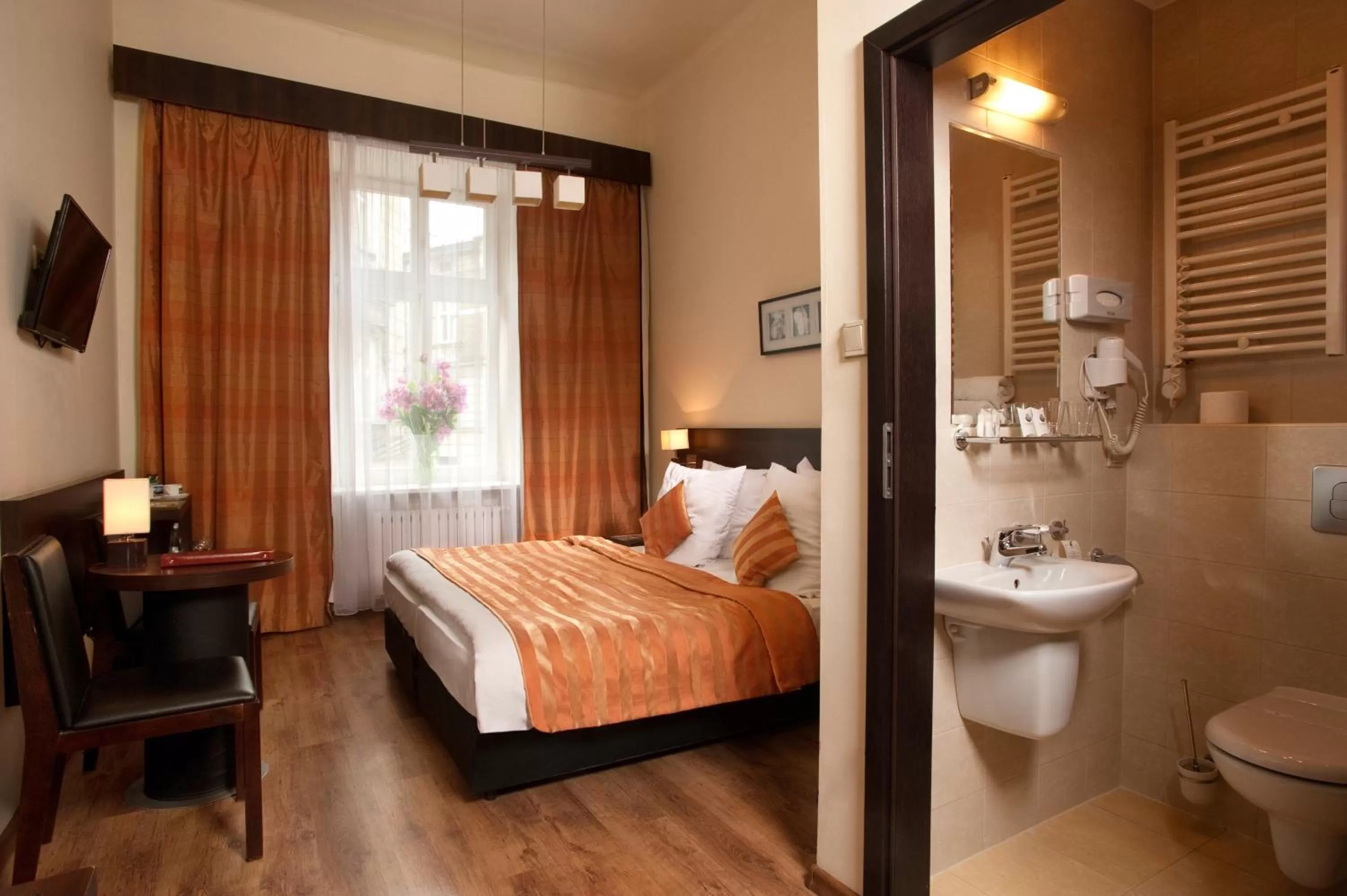 Bed in Spatz Aparthotel